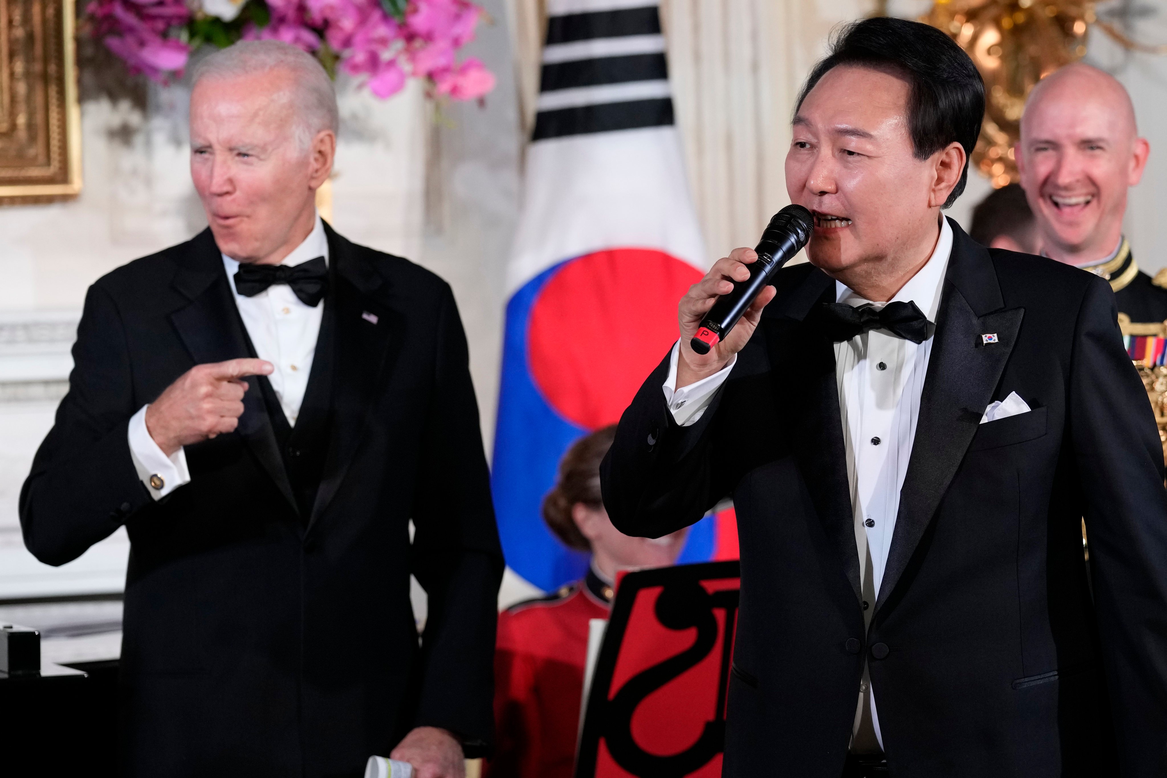President Joe Biden reacts as South Korea’s President Yoon Suk Yeol sings American Pie in the State Dining Room of the White House in Washington on April 26. Washington and Seoul continue to play lip service to their interest in dialogue with Pyongyang. Photo: AP