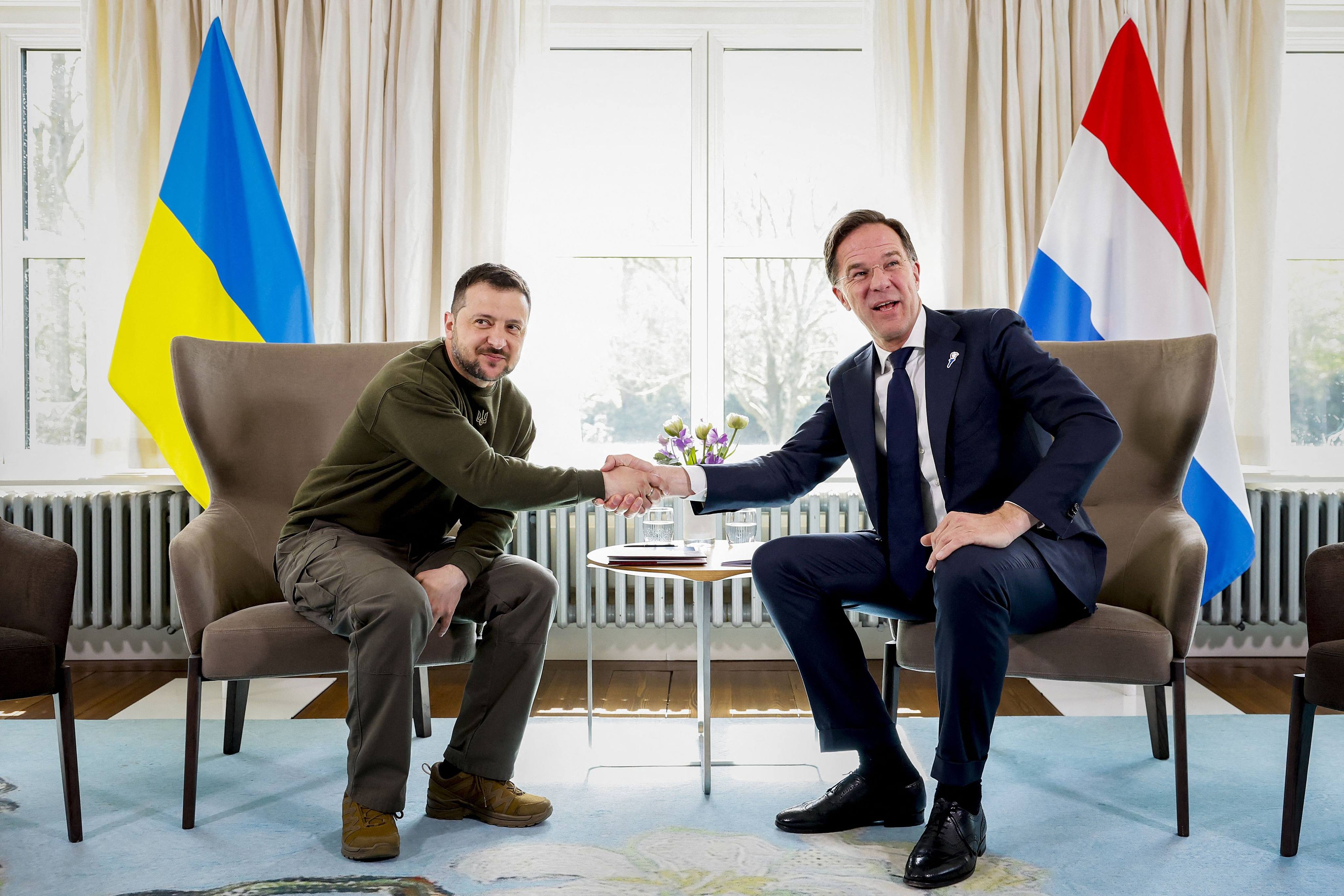 Ukrainian President Volodymyr Zelensky shakes hands with Dutch Prime Minister Mark Rutte on a first visit to the Netherlands. Photo: AFP