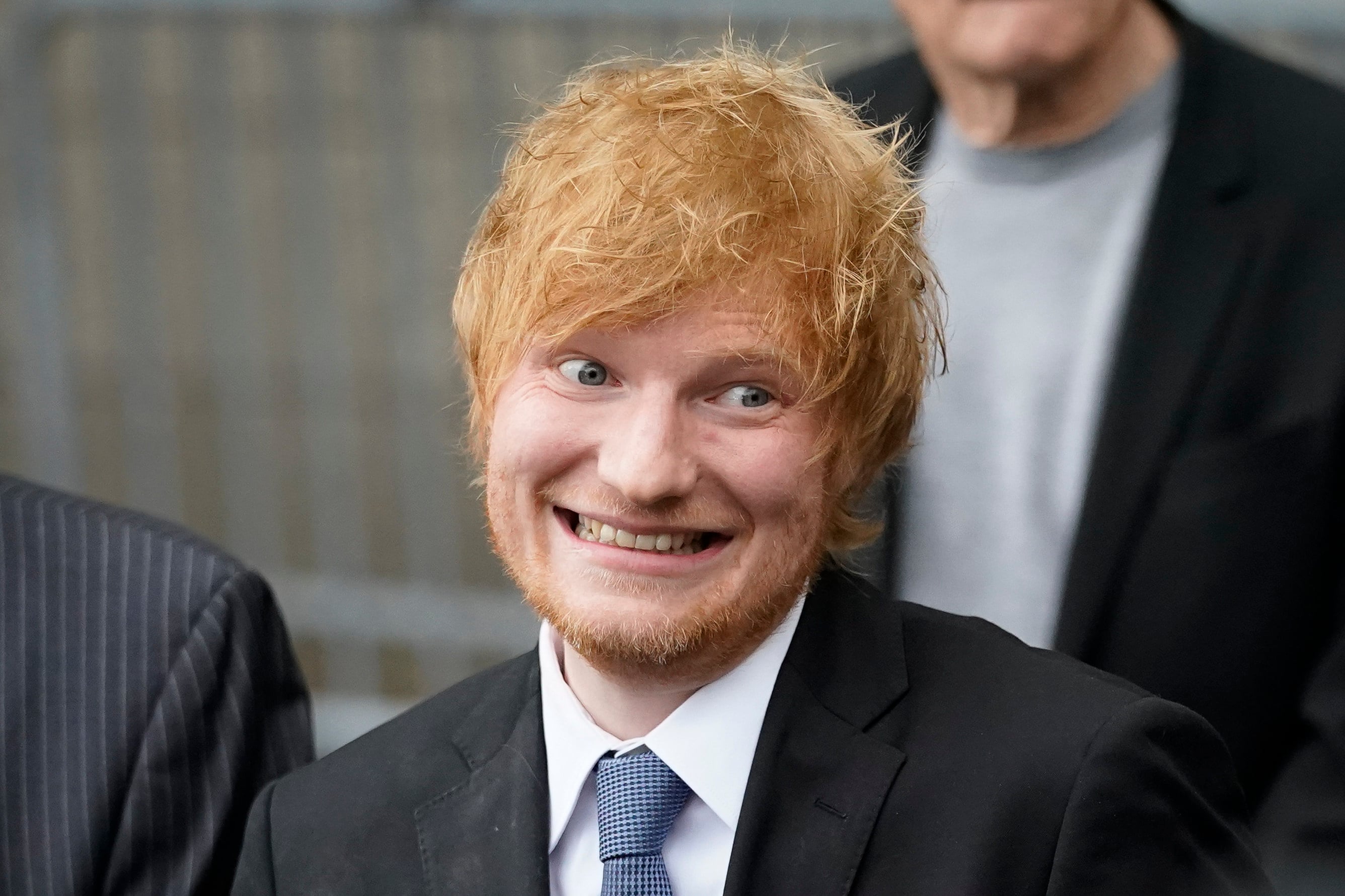 UK singer Ed Sheeran prepares to speak to the media outside New York Federal Court after wining his copyright infringement trial on Thursday. Photo: AP