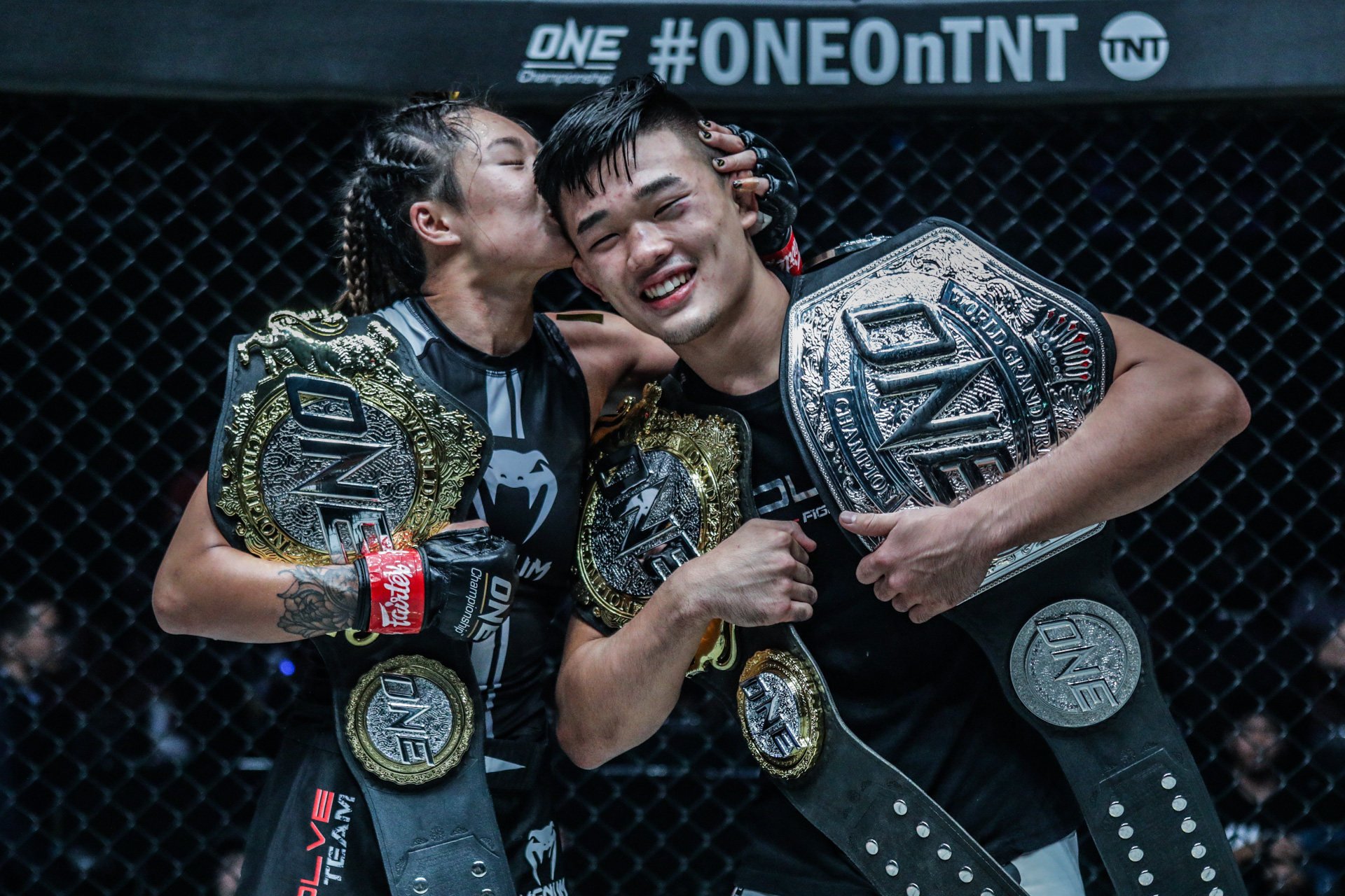Angela Lee kisses her brother Christian Lee at Century Part 1 in Tokyo, Japan on 13 October, 2019. Photos: ONE Championship. 