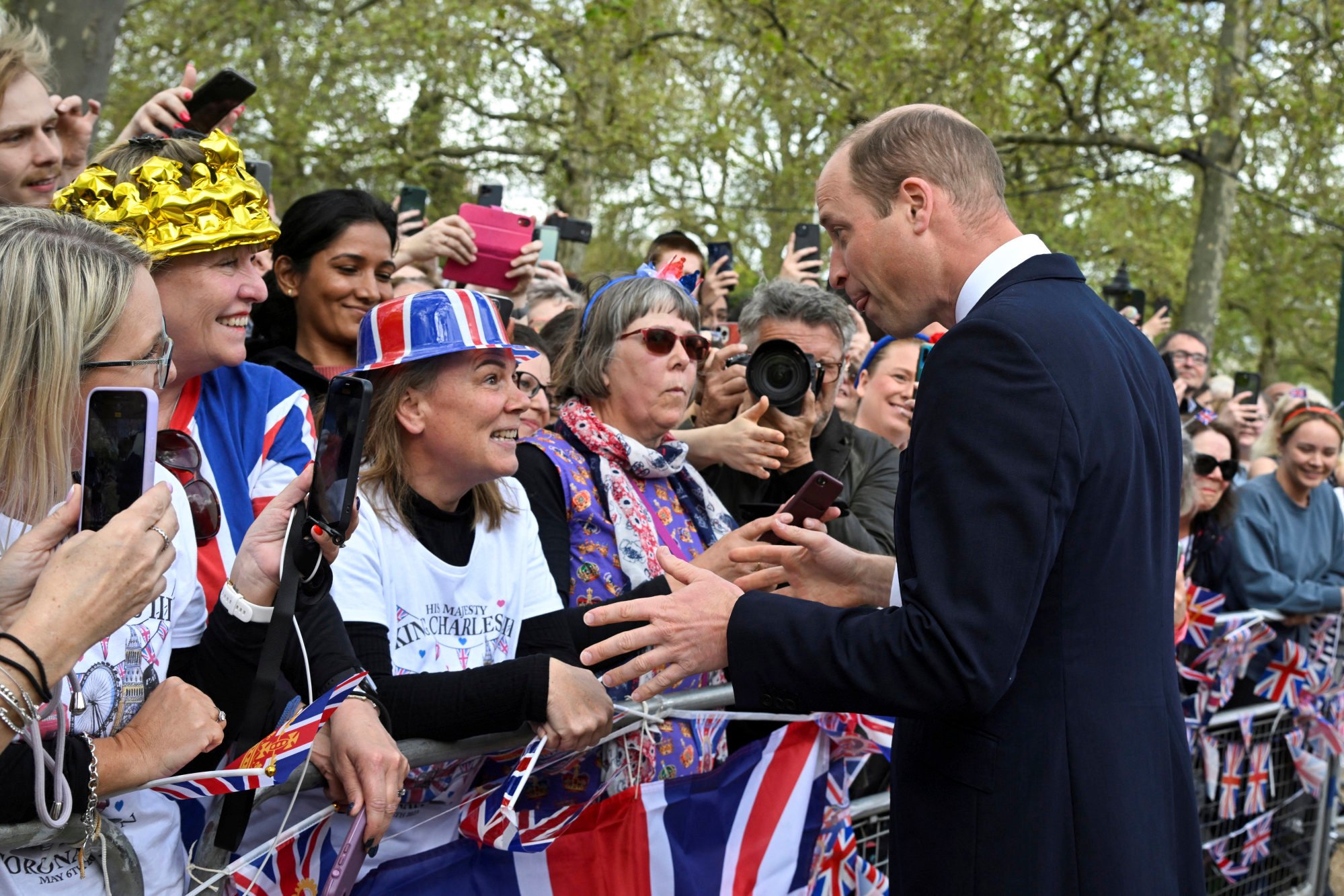 King Charles coronation: royals surprise crowd outside Buckingham ...