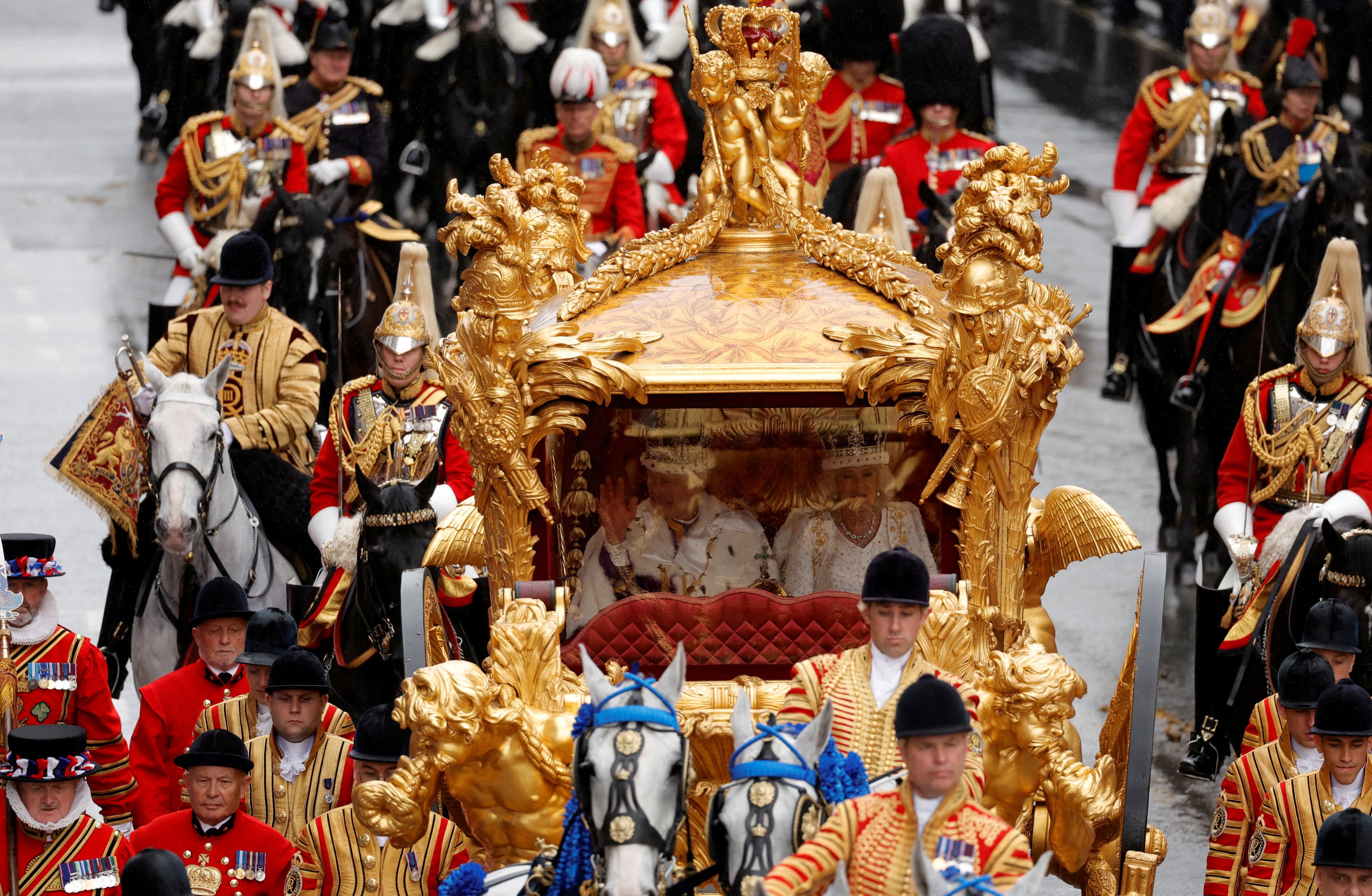 Britain’s King Charles and Queen Camilla travel in the Gold State Coach following their coronation ceremony. Photo: Reuters