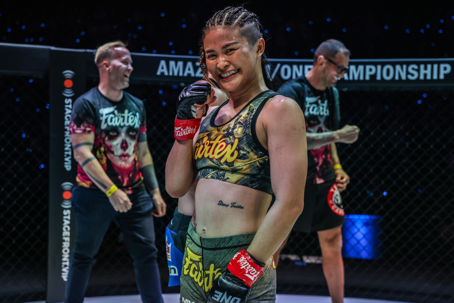 Stamp Fairtex celebrates her win over Alyse Anderson at ONE Fight Night 10. Photos: ONE Championship