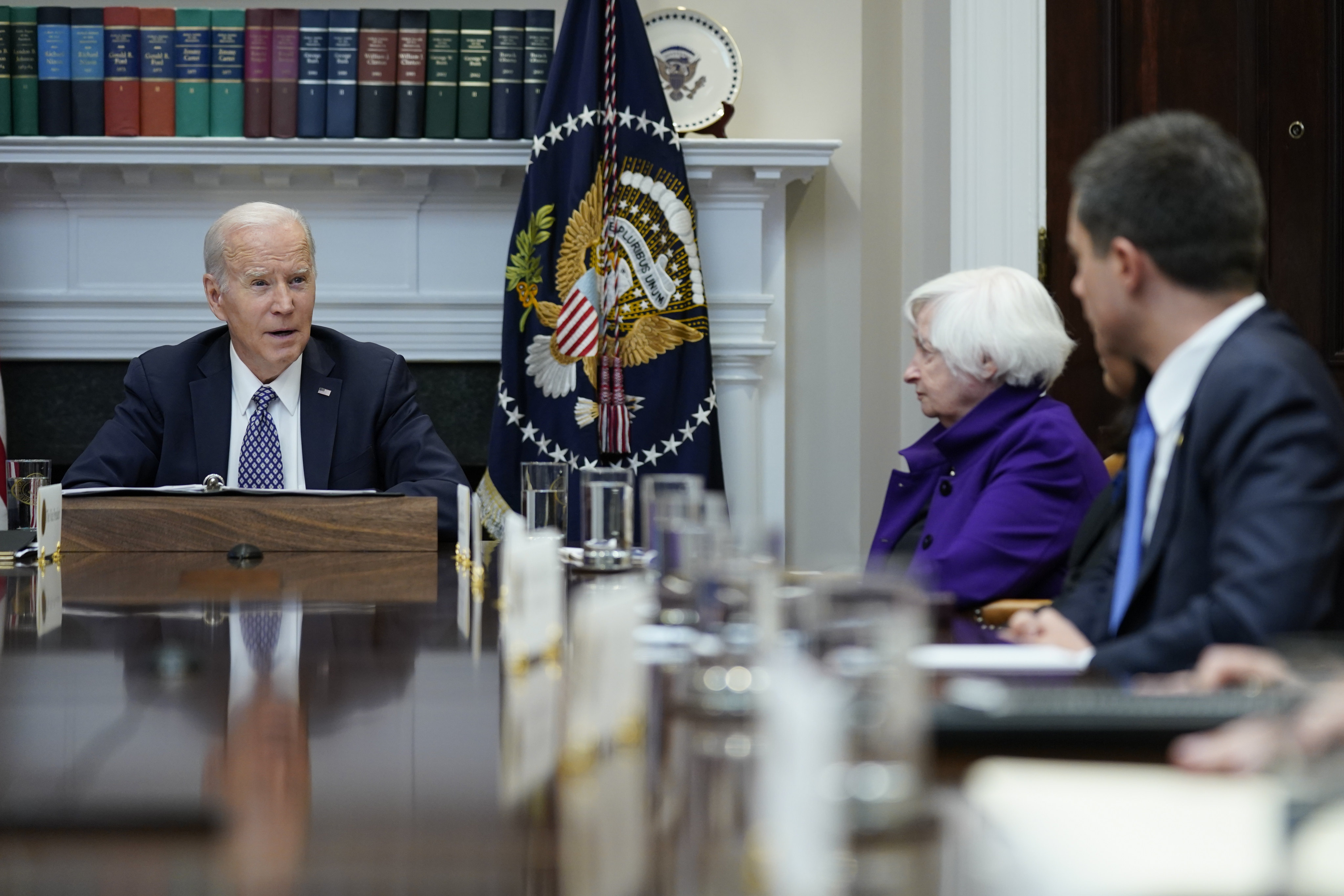 President Joe Biden, left, speaks during a meeting in the White House on May 5 as Transportation Secretary Pete Buttigieg (right) and Treasury Secretary Janet Yellen listen. Given the new Washington consensus on China, even Yellen has reaffirmed that national security now comes before economics. Photo: AP 