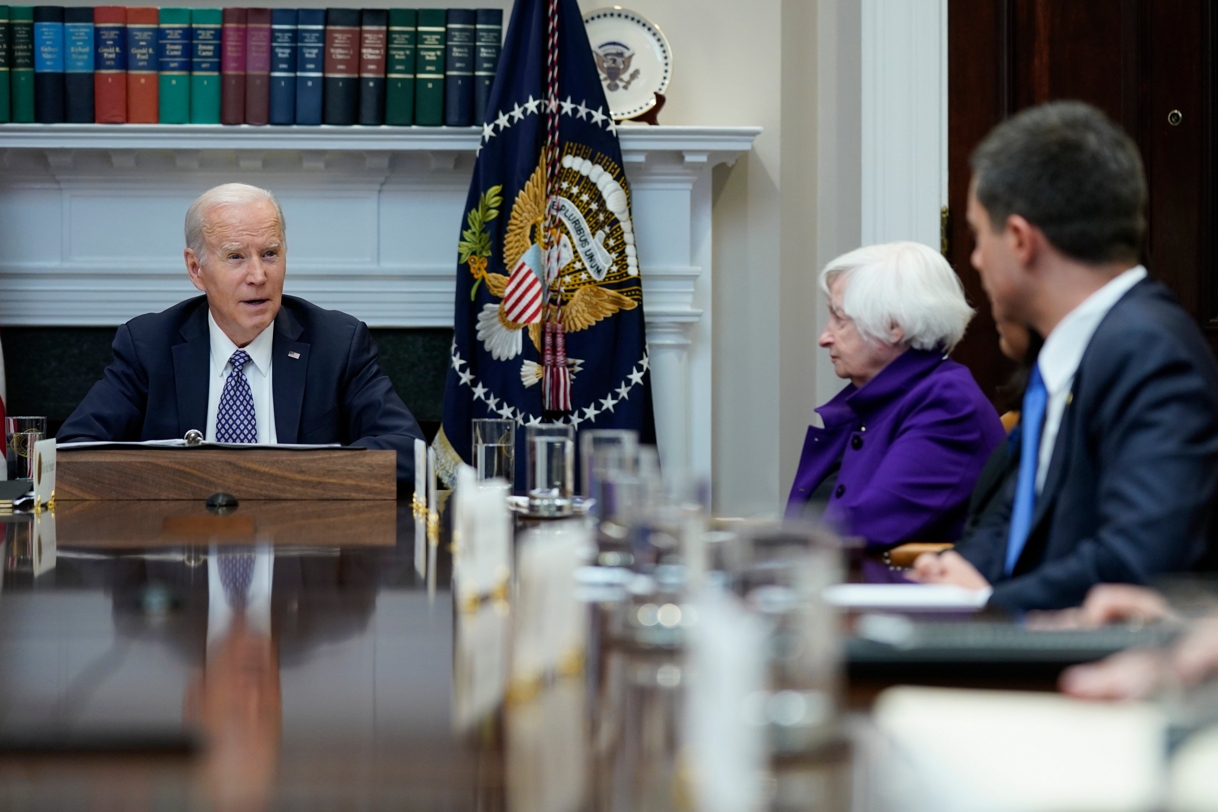 President Joe Biden, left, speaks during a meeting in the White House on May 5 as Transportation Secretary Pete Buttigieg (right) and Treasury Secretary Janet Yellen listen. Given the new Washington consensus on China, even Yellen has reaffirmed that national security now comes before economics. Photo: AP 