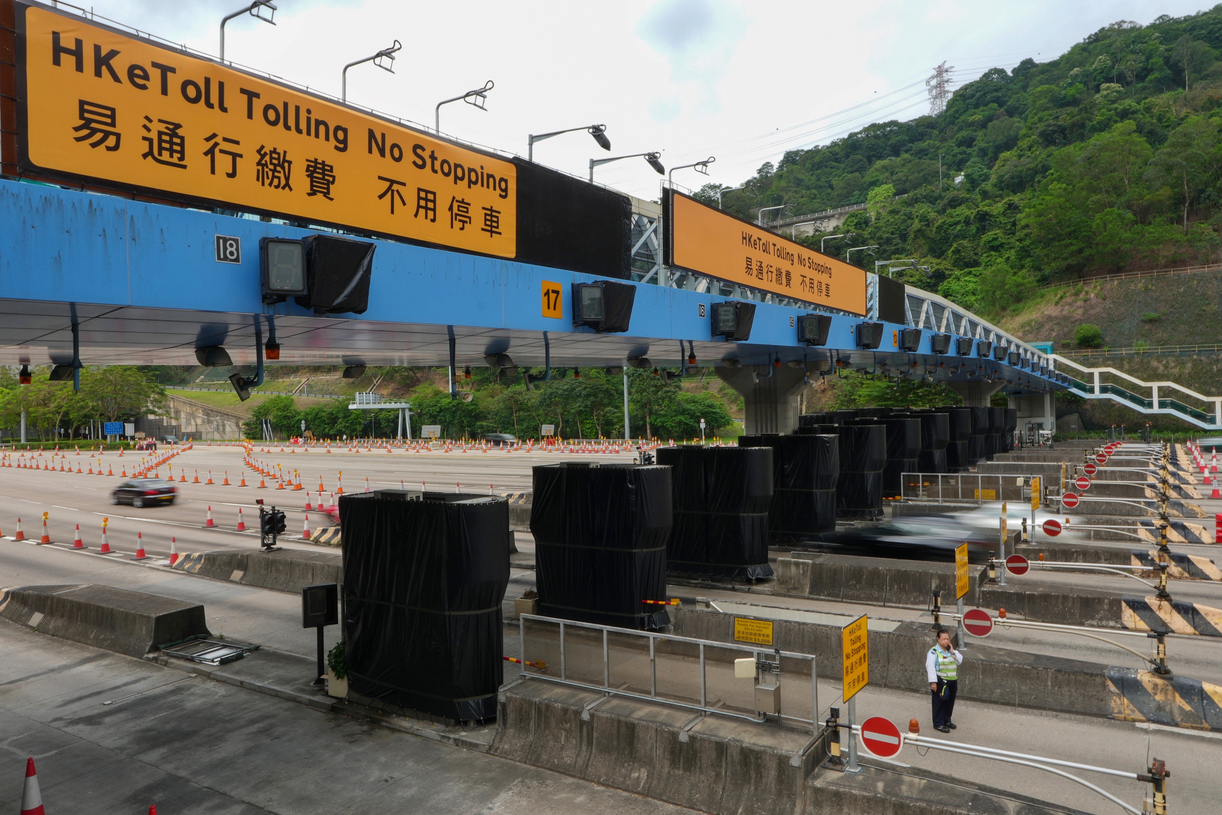 Toll booths at the Tsing Sha Control Area draped in black cloth to alert motorists they are no longer in use.  Photo: Elson Li