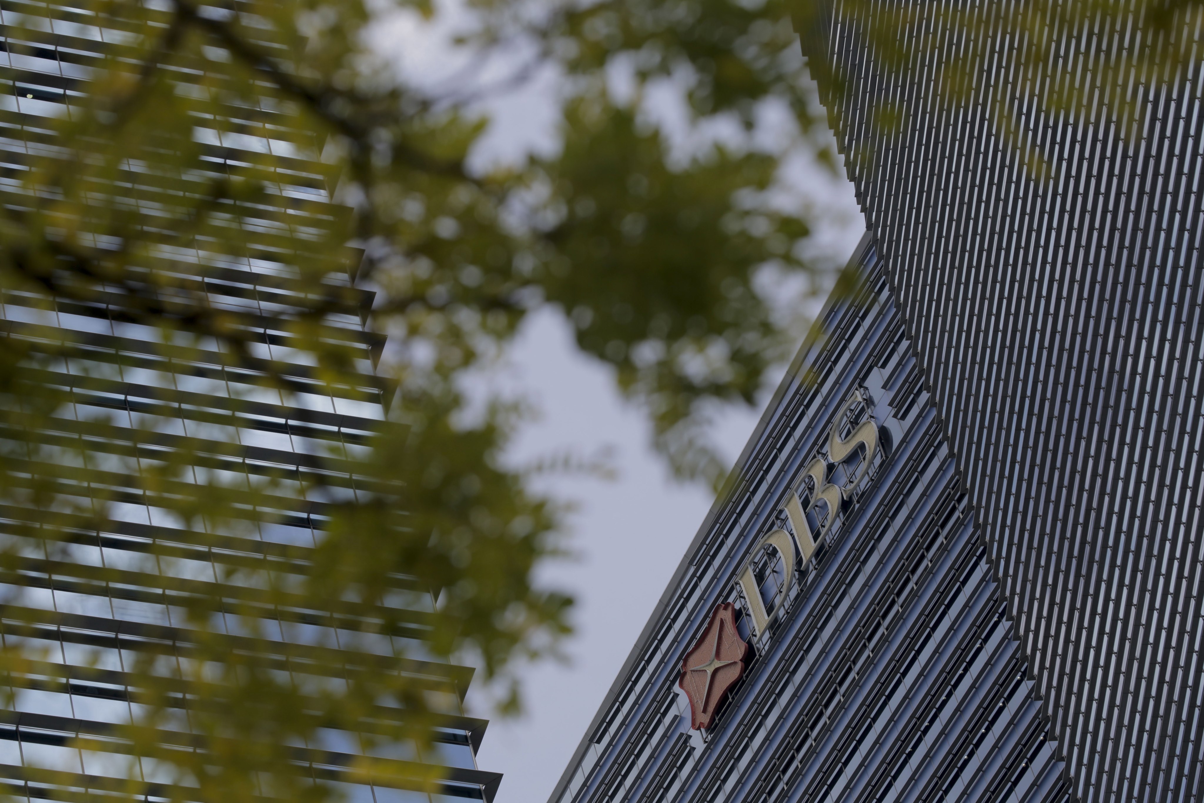 The logo of DBS Bank is pictured on a building in the financial district of Singapore on March 26, 2020. Photo: EPA-EFE