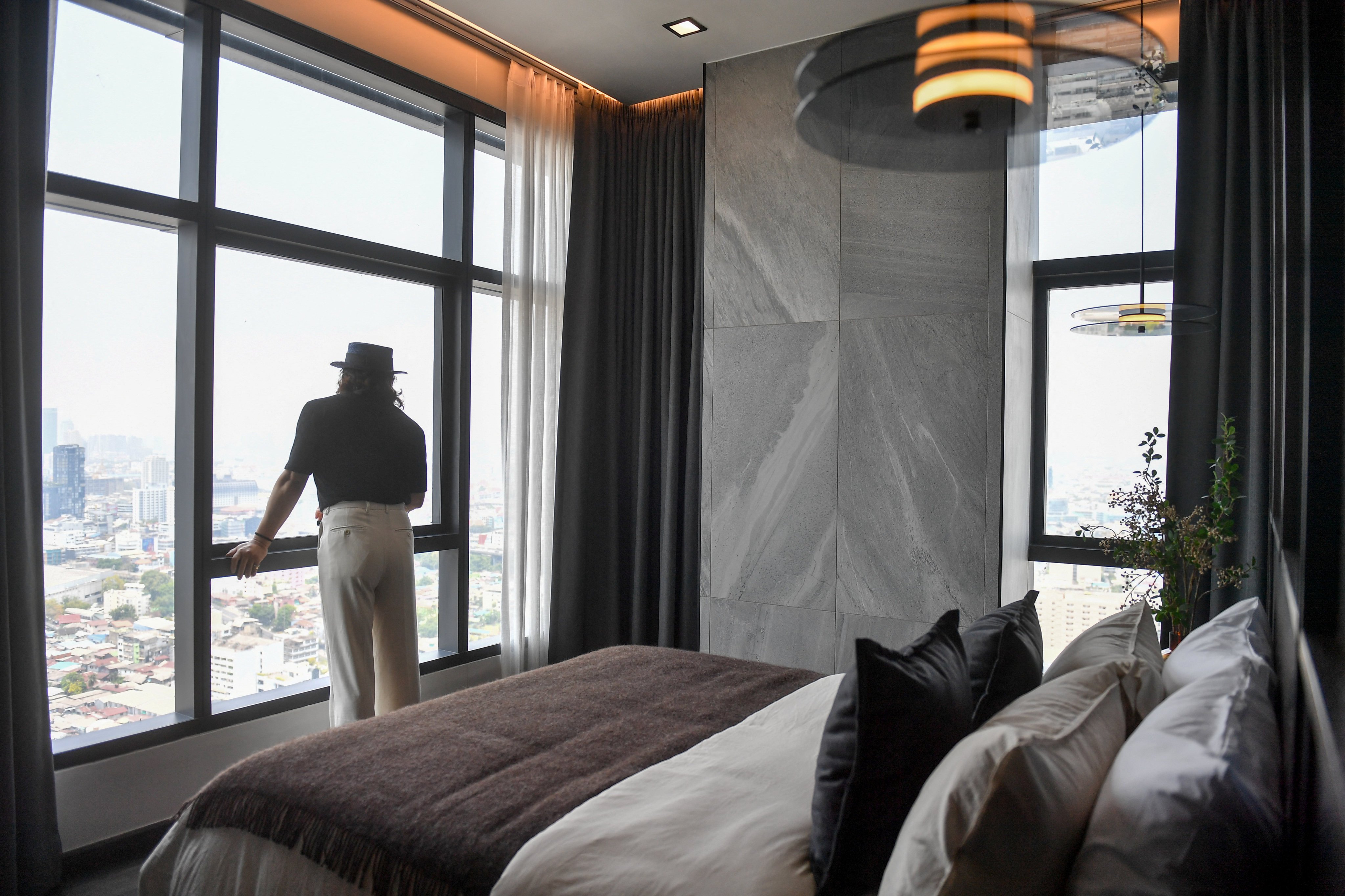 Prospective property buyer Daniel Bian, from Shanghai, tours a luxury condominium in Bangkok last month. Photo: Reuters