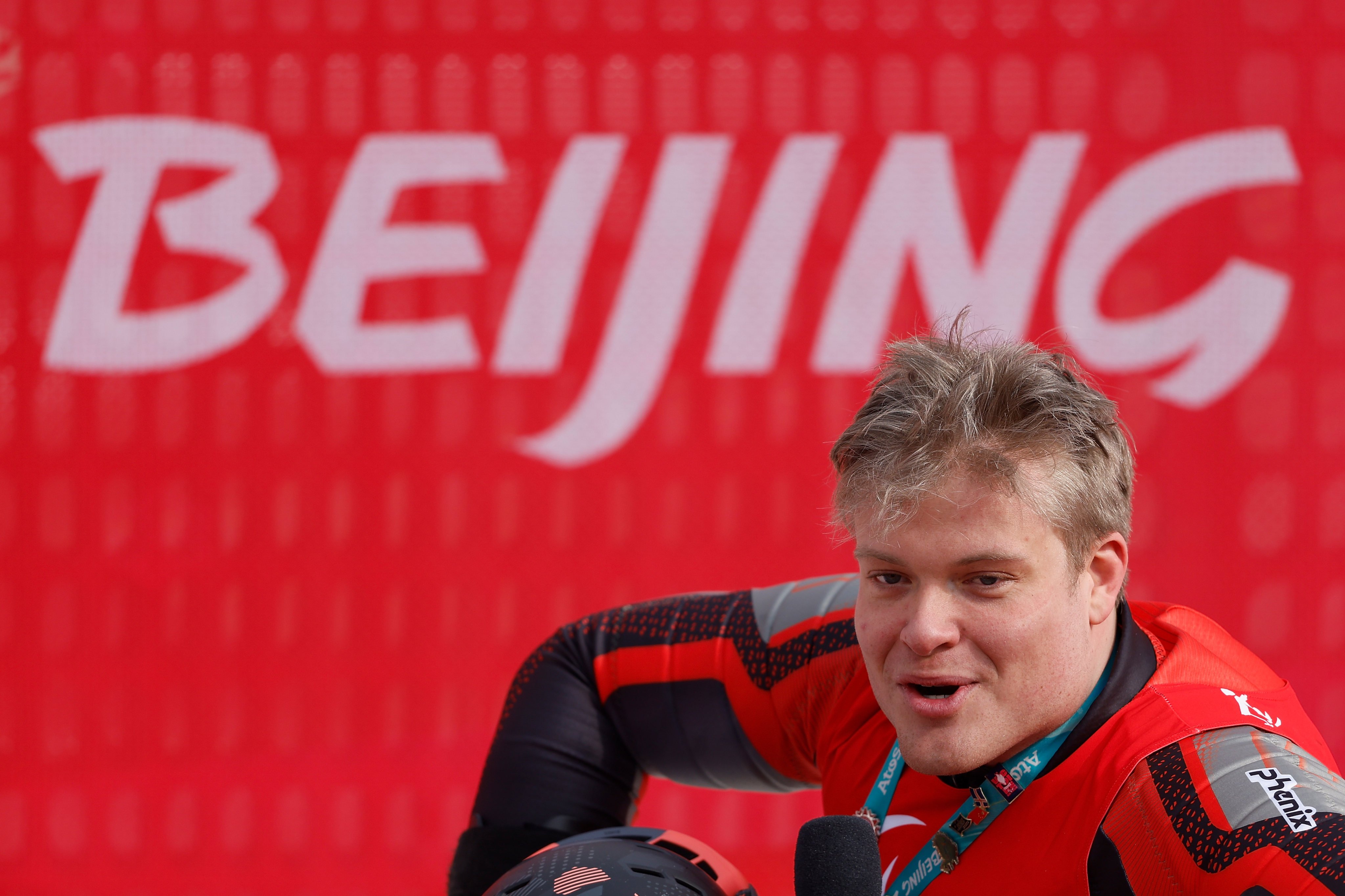 Jesper Pedersen speaks with the media after winning gold in the men’s slalom sitting at the Beijing 2022 Winter Paralympics. Photo: Getty Images