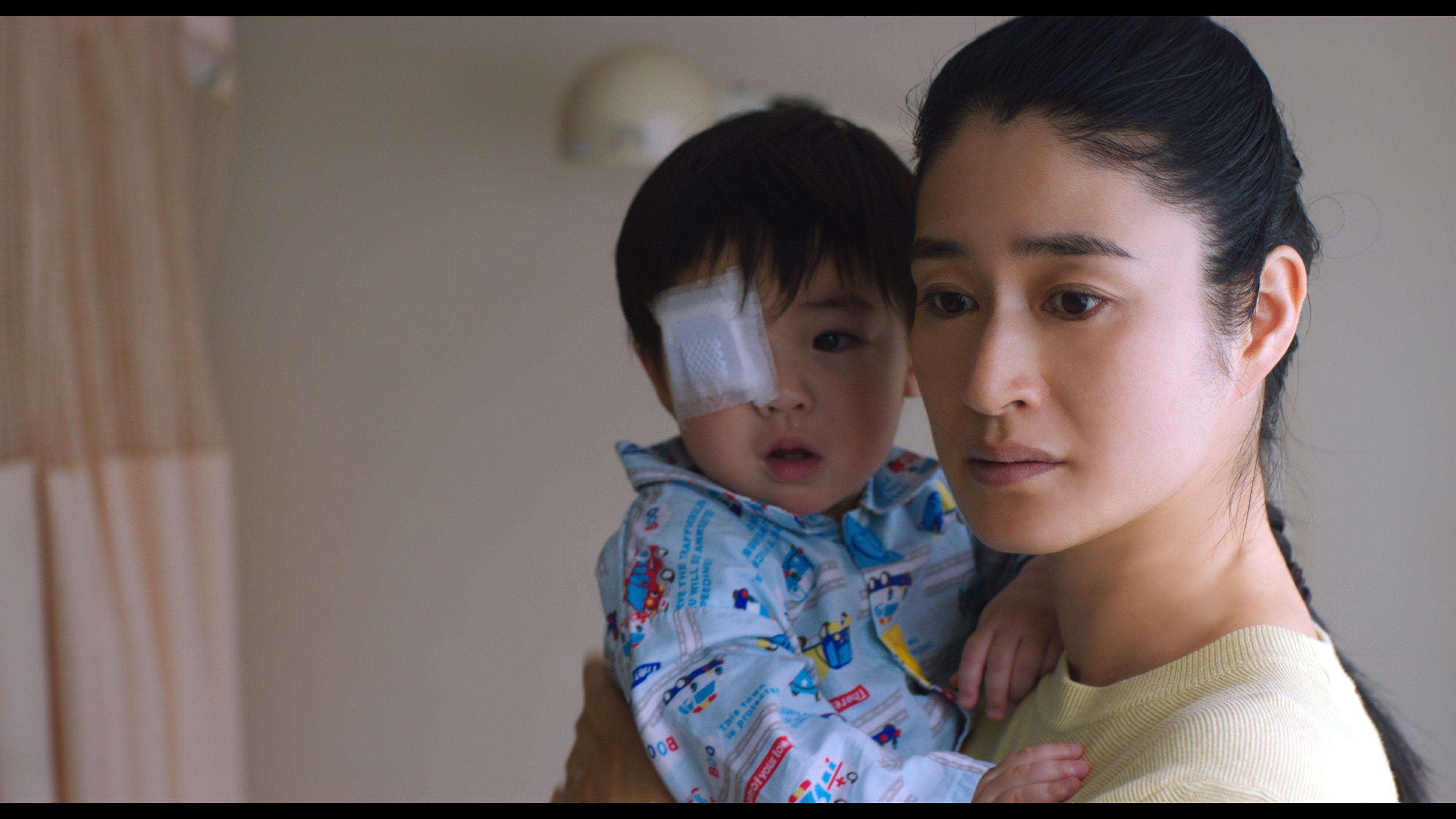 Koyuki (right) in a still from “A Mother’s Touch”.