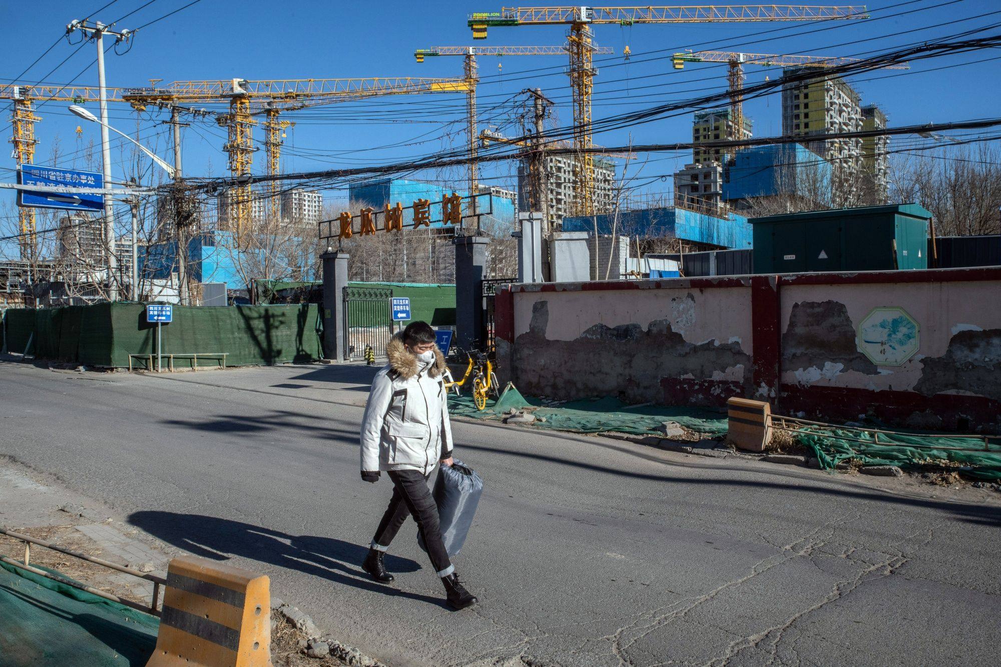 Residential buildings under construction at the Honor of China project, originally developed by defaulted Shimao Group Holdings Ltd. before sold to state-owned rival China Resources Land Ltd., in Beijing, China. Photo: Bloomberg