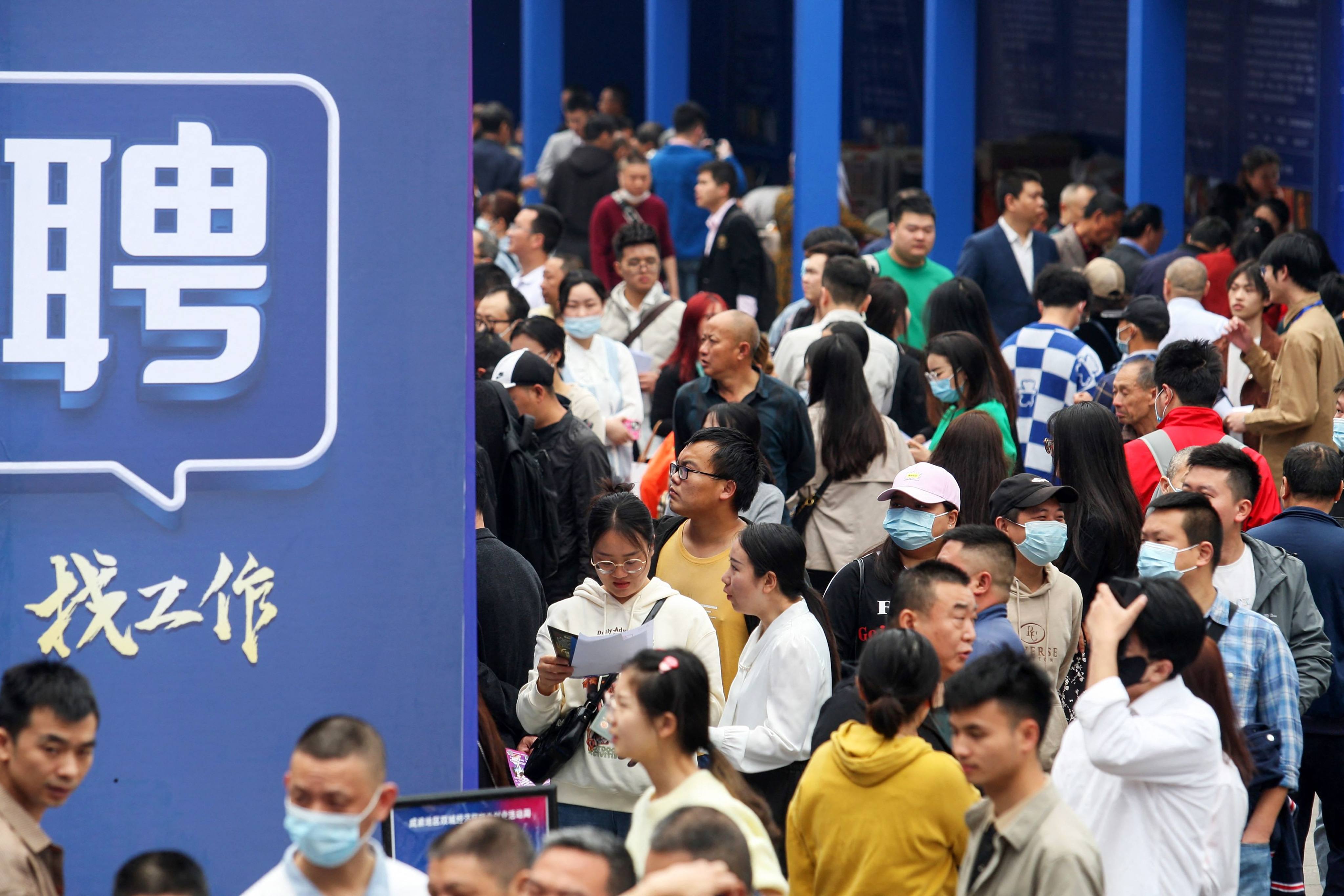 People attend a job fair in China’s southwestern city of Chongqing on April 11. The country’s youth unemployment rate climbed to 19.6 per cent in March. Photo: AFP 