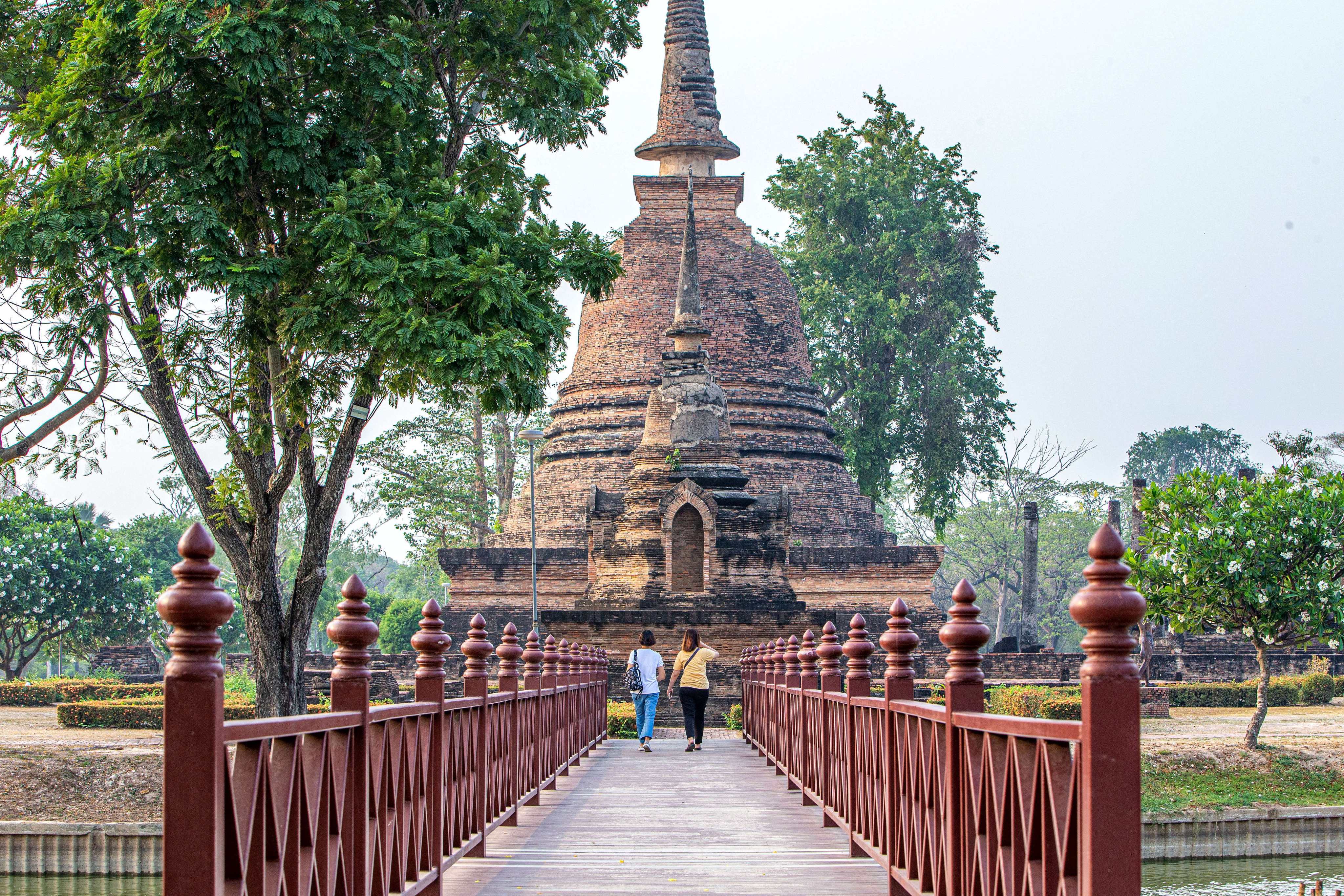 Tourists at the Historic Town of Sukhothai in Thailand. Photo: Xinhua