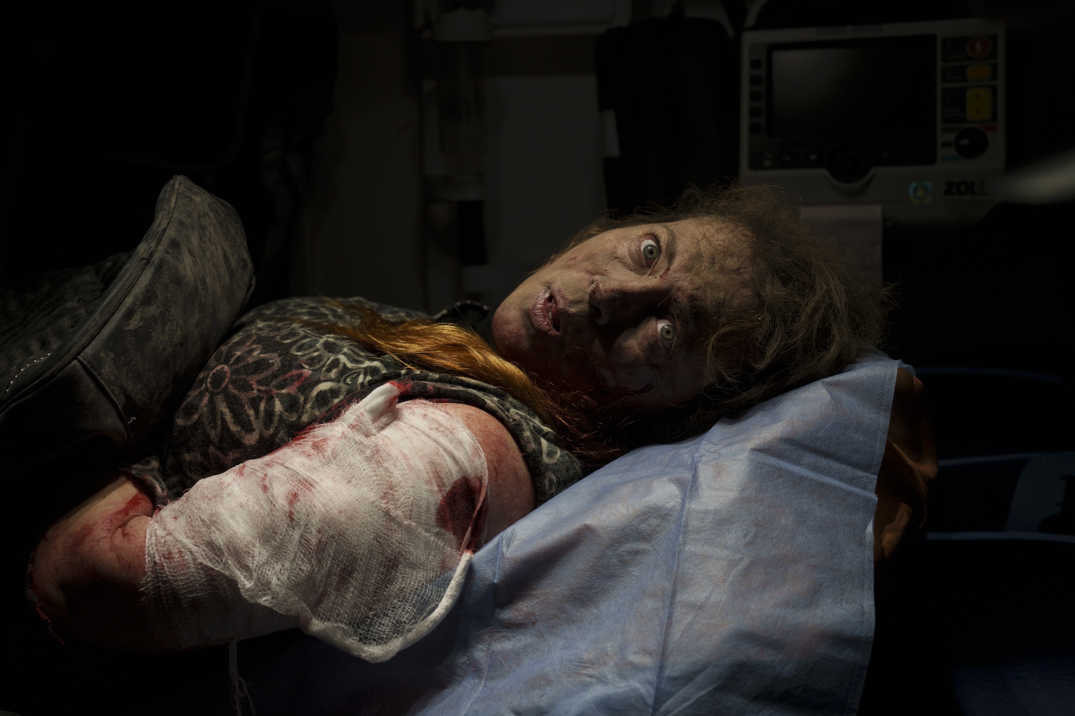 A resident wounded after a Russian attack lies inside an ambulance in Kherson, southern Ukraine, November 24, 2022. Photo: AP