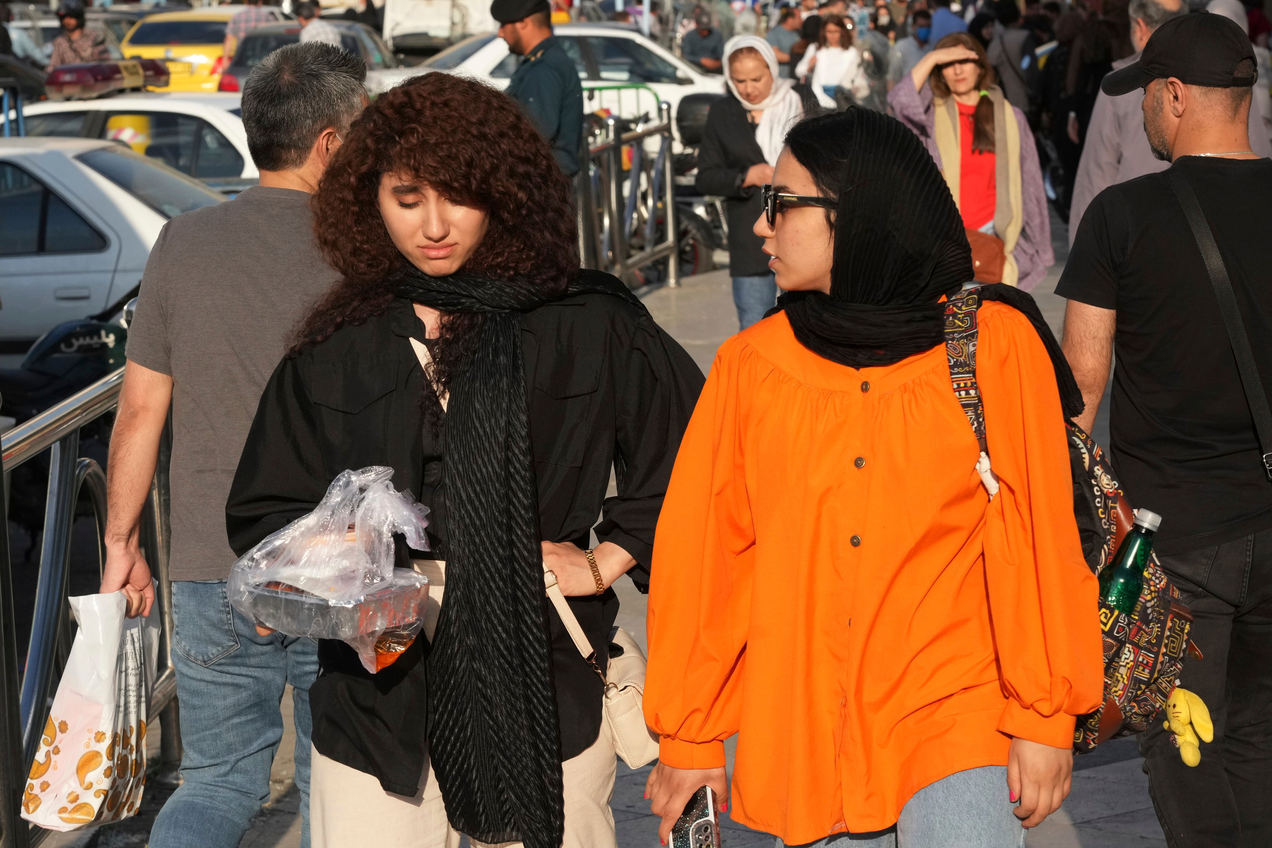 Authorities have made legal threats and closed down some businesses serving women not wearing the hijab. Photo: AP