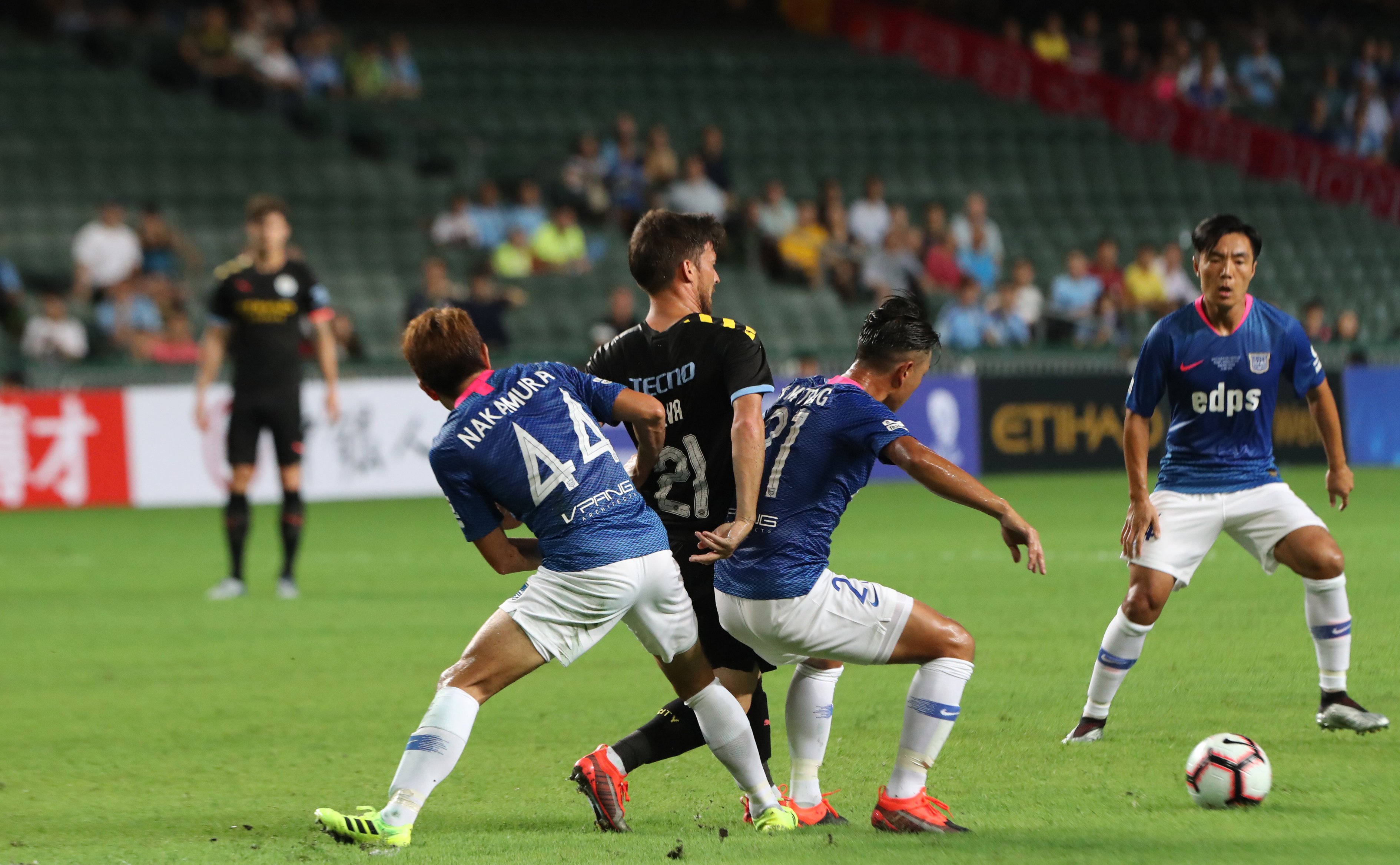 There were plenty of empty seats when Kitchee (in blue) hosted Manchester City in 2019. Photo: K.Y. Cheng