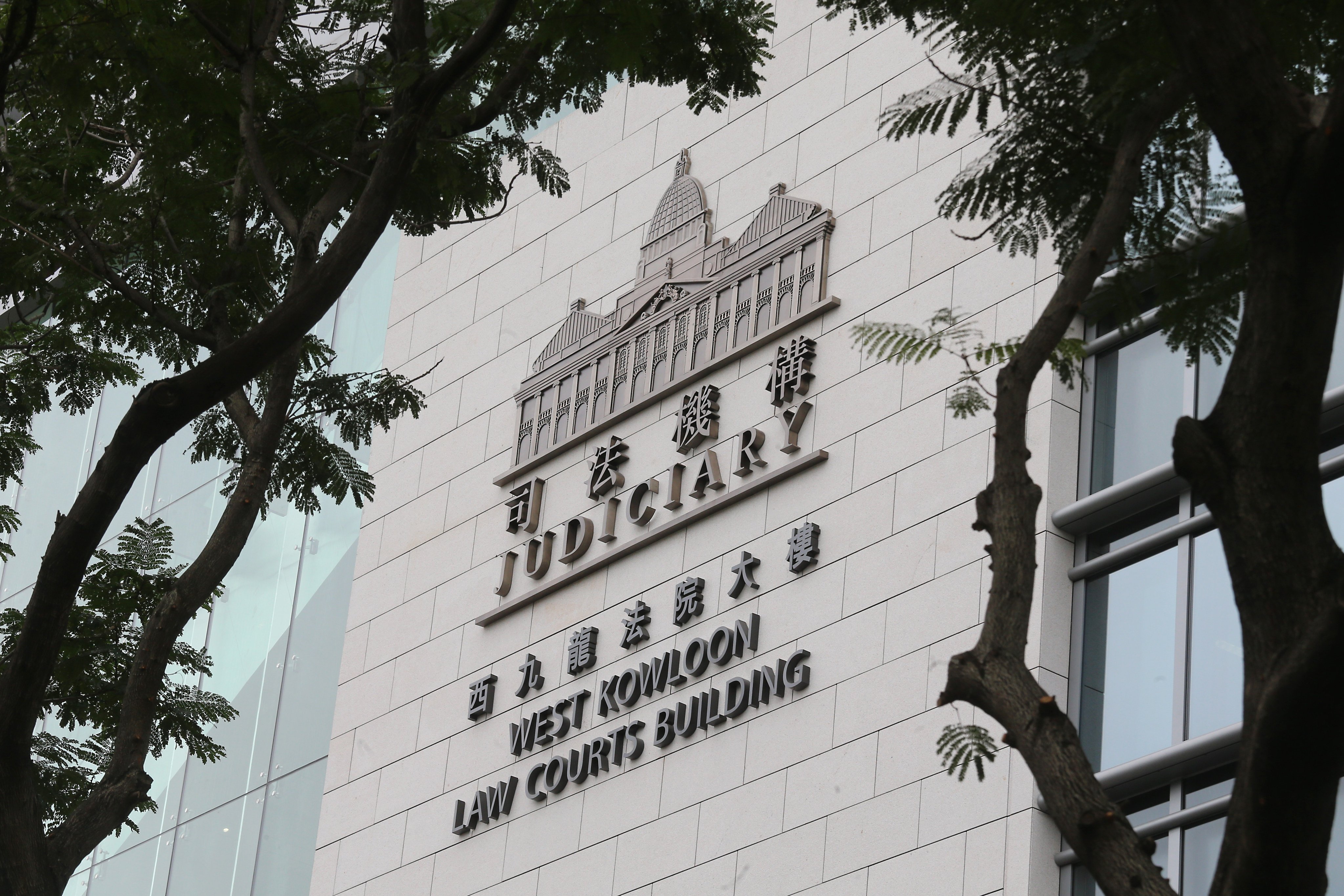 A healthcare worker appeared in the West Kowloon Court on a bribery charge. Photo: Dickson Lee