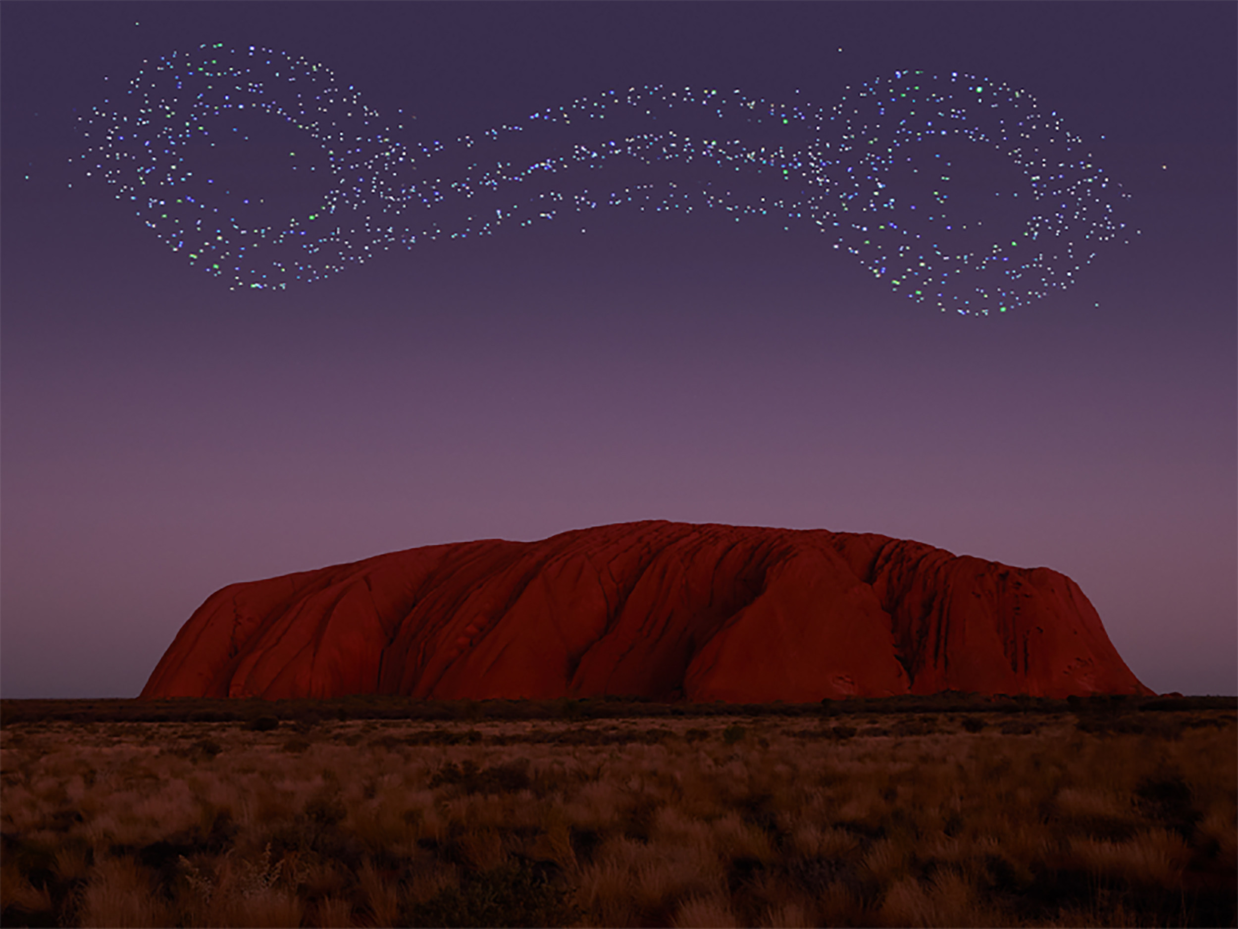 Drones fly above Uluru during the Wintjiri Wiru drone show, in Australia. The country has started offering several tourism experiences tied to Aboriginal history. Photo: Voyages Indigenous Tourism Australia