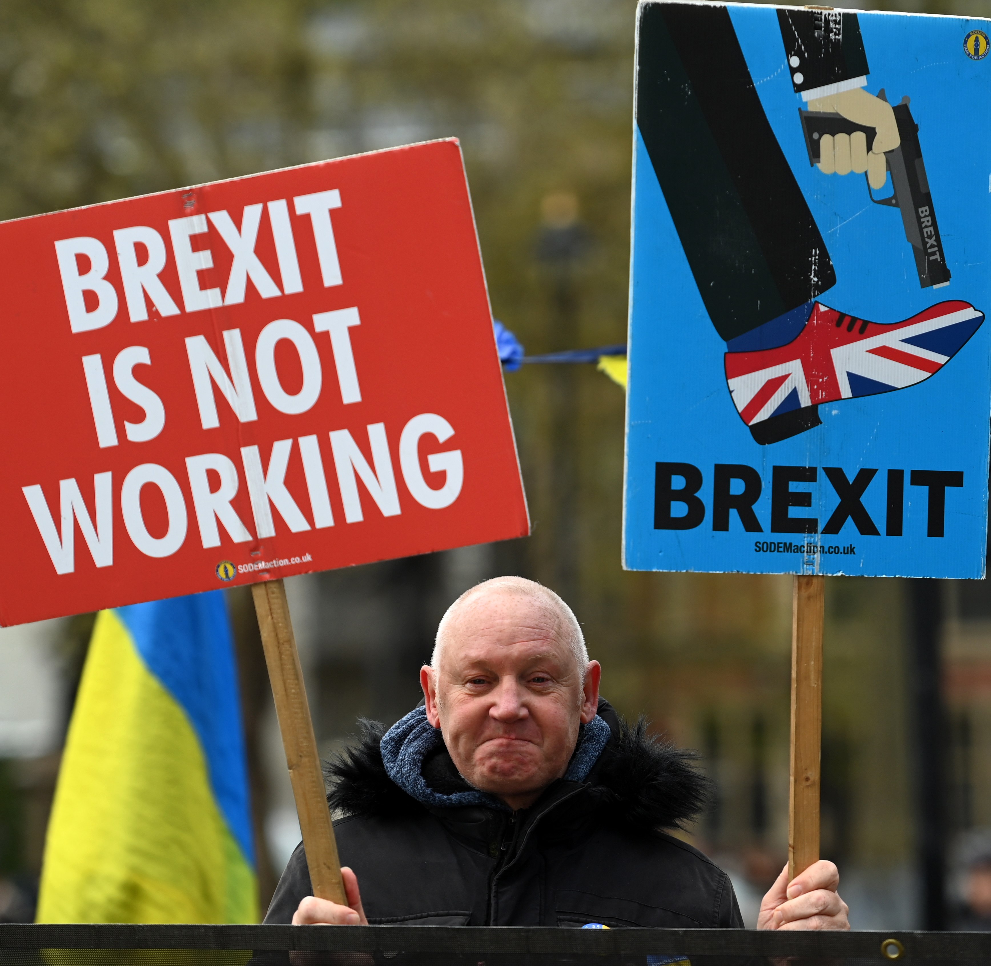 An anti-Brexit protester demonstrates outside parliament in London in February. Photo: EPA-EFE