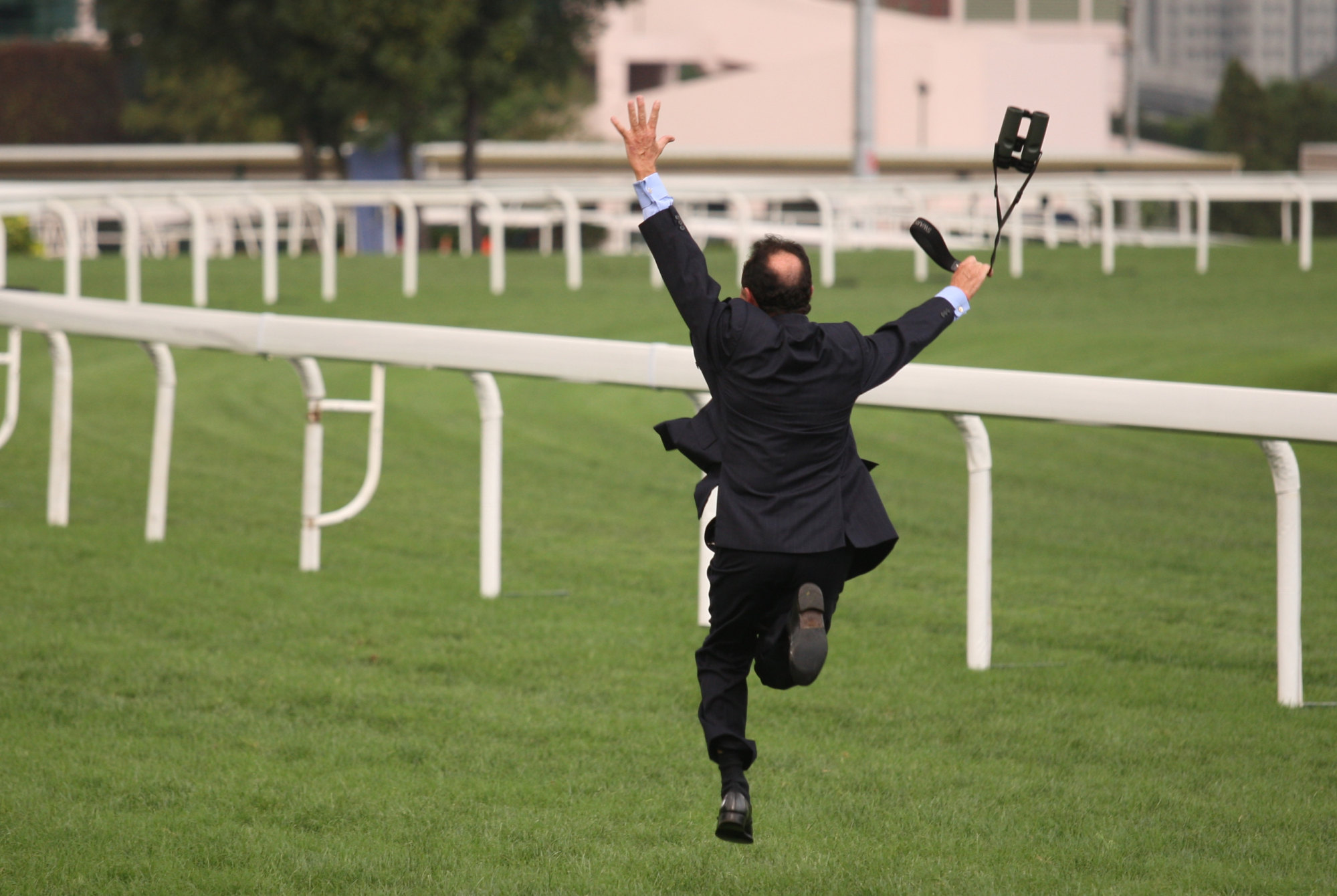 Gary Moore takes off down the Sha Tin track after Viva Pronto’s win in the 2010 Hong Kong Macau Trophy.