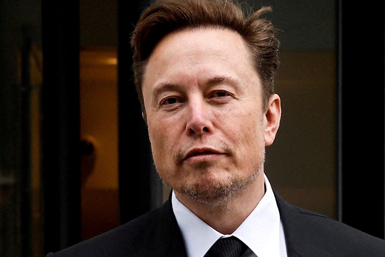 Elon Musk leaves Tesla’s local office in Washington in January. Photo: Reuters