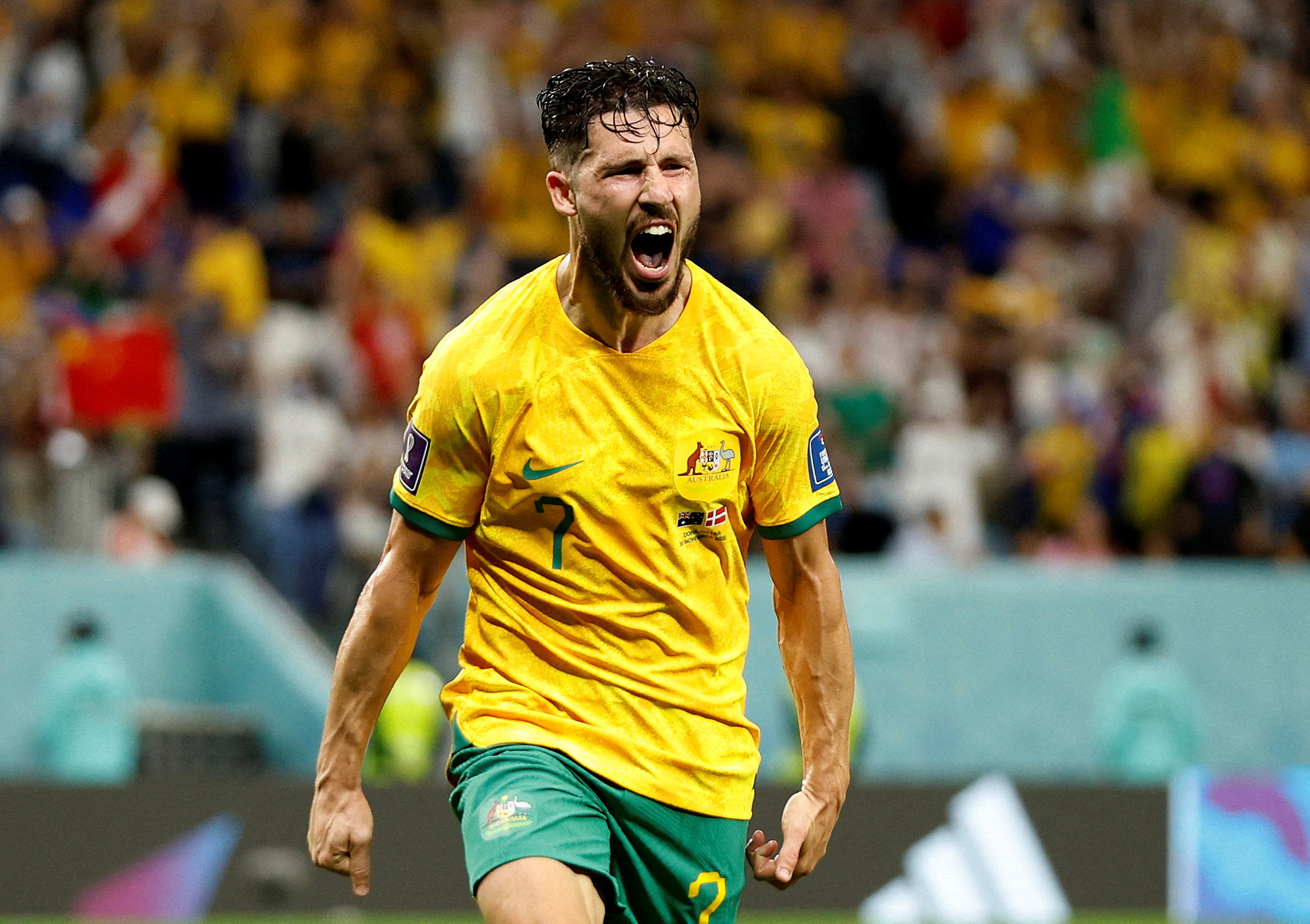 Australia’s Mathew Leckie celebrates scoring against Denmark at the World Cup in Qatar. Photo: Reuters