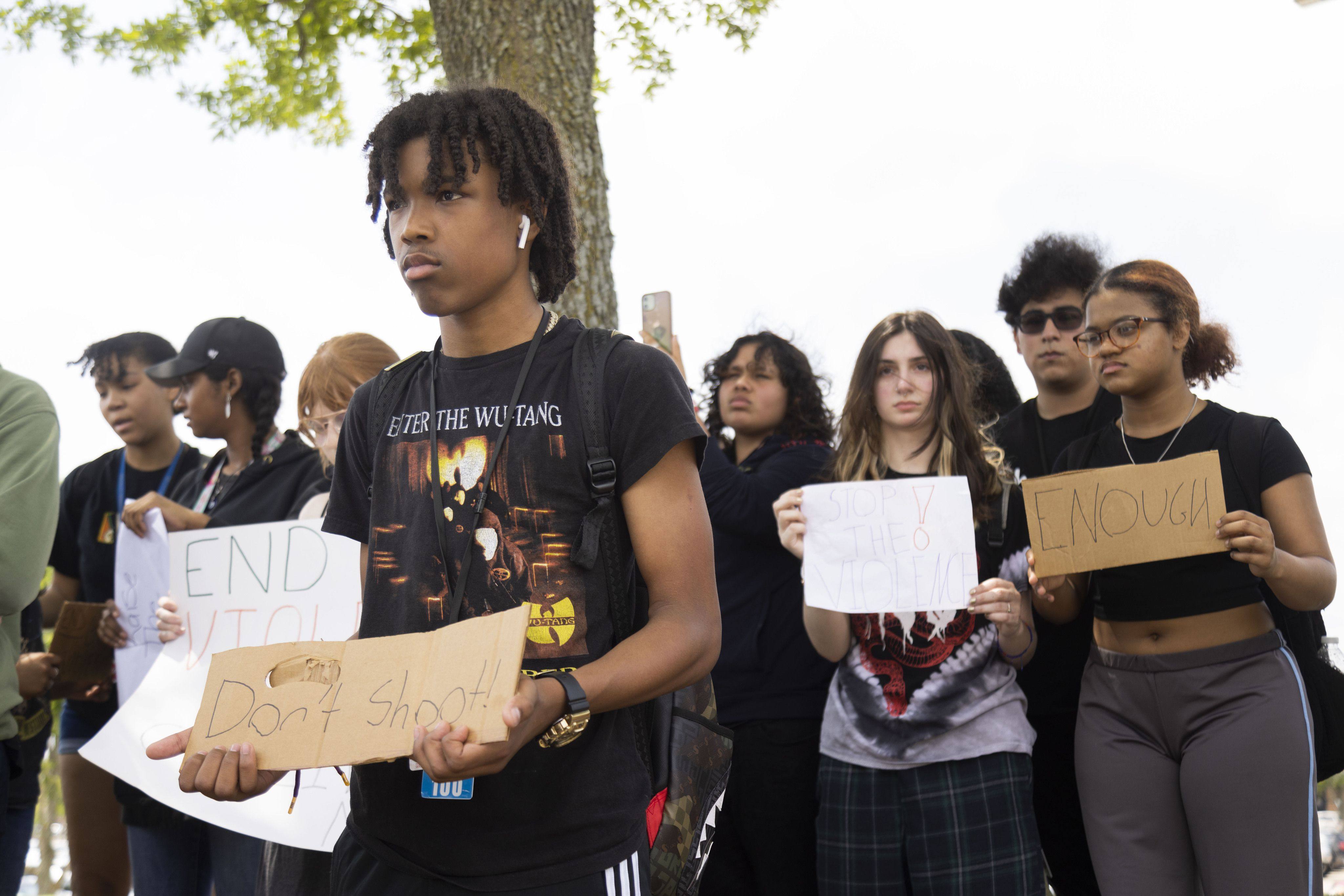 Teenagers in Texas, US, participate in a walkout over gun violence on Thursday. A gunman fatally shot eight people and wounded seven others on May 6 at a shopping centre before being killed by a police officer. Photo: via TNS