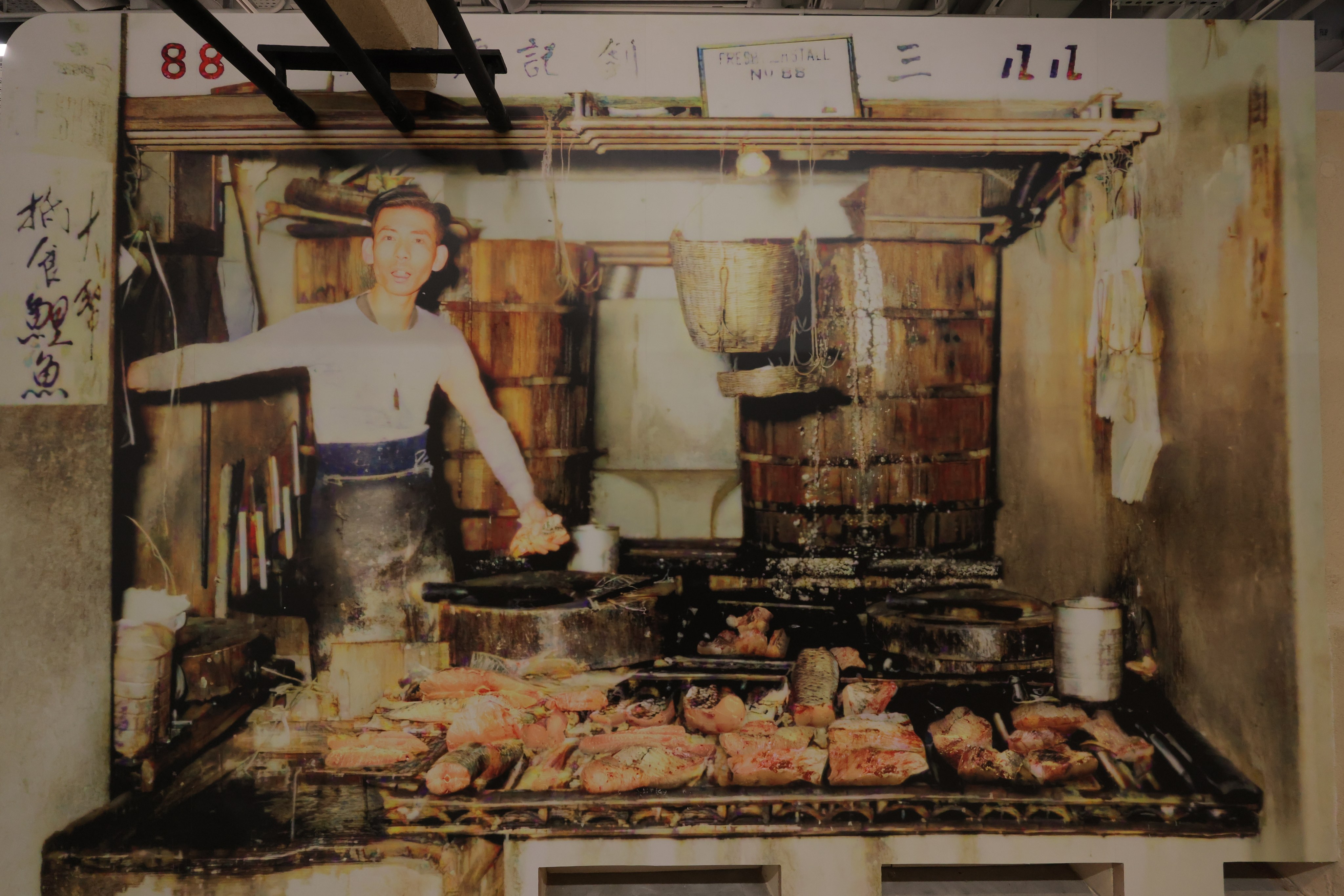 A team of artists working for the Urban Renewal Authority has restored a 1950s photo using AI-based software and turned it into a display at the Central Market. Photo: Jelly Tse
