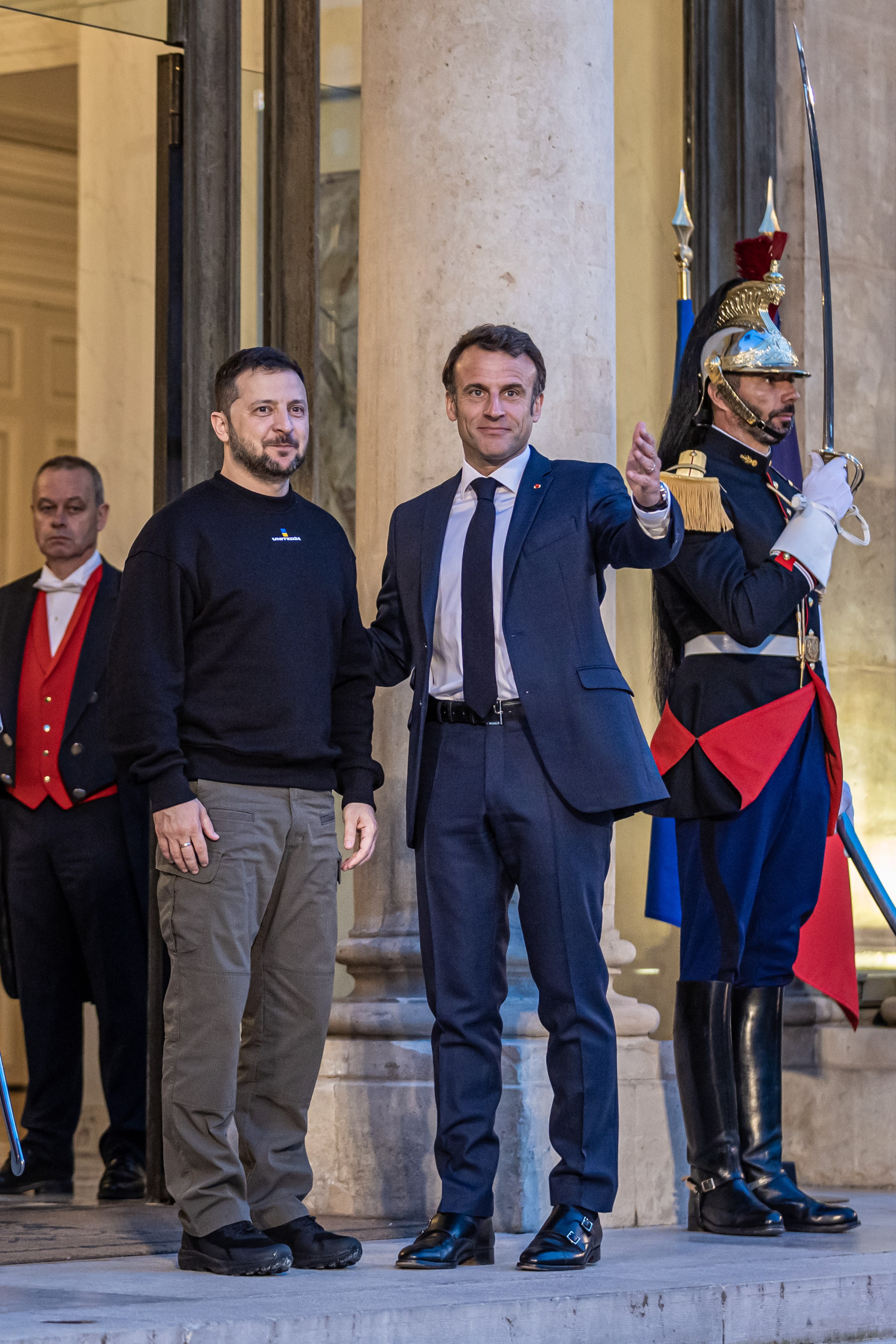 French President Emmanuel Macron, right, welcomes his Ukrainian counterpart  Volodymyr Zelensky at the Elysee Palace in Paris, France on Sunday. Photo: EPA-EFE