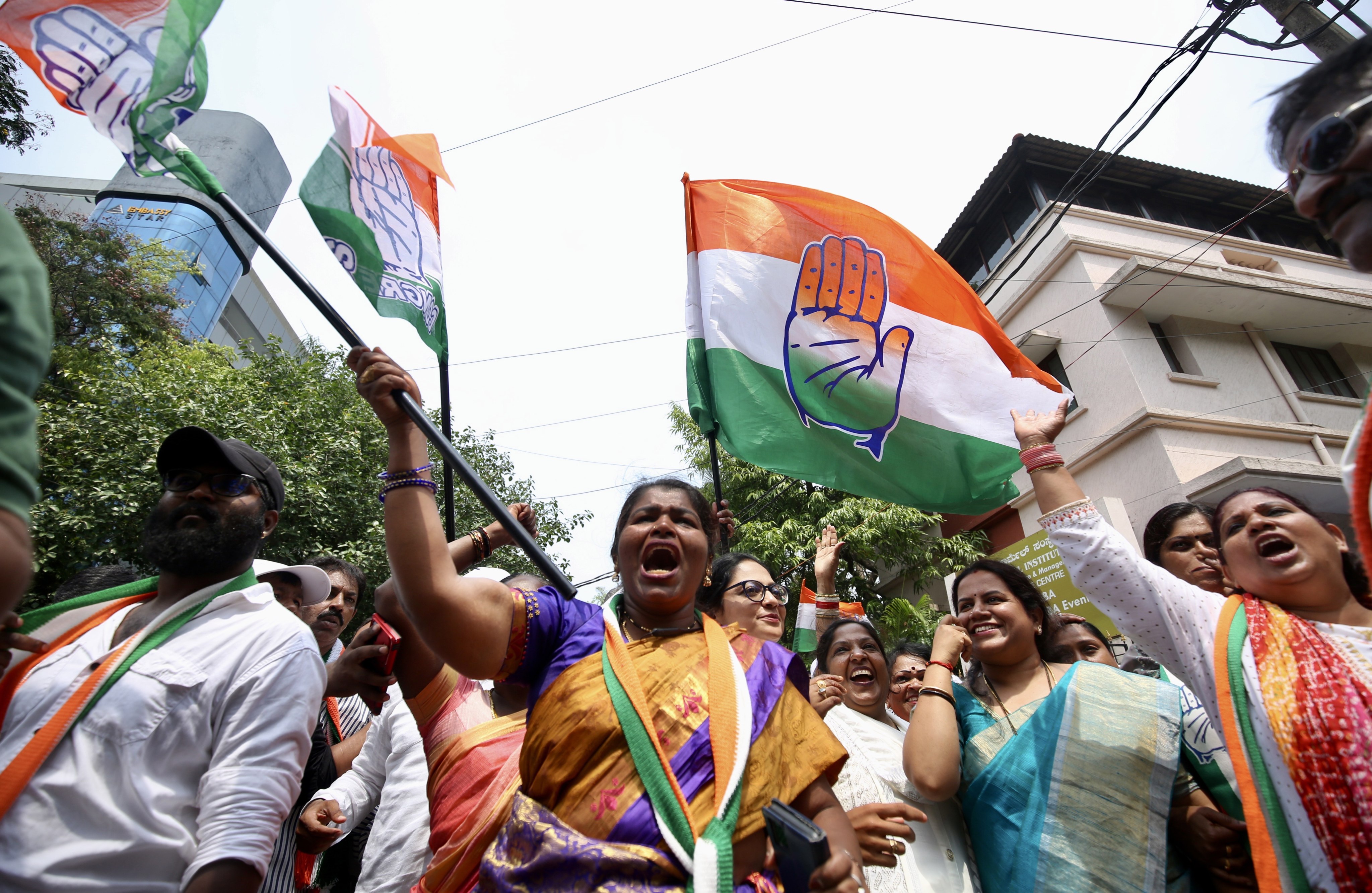Supporters of India’s Congress party celebrate its victory in the Karnataka state assembly election in the southern city of Bangalore on Saturday. Photo: EPA-EFE