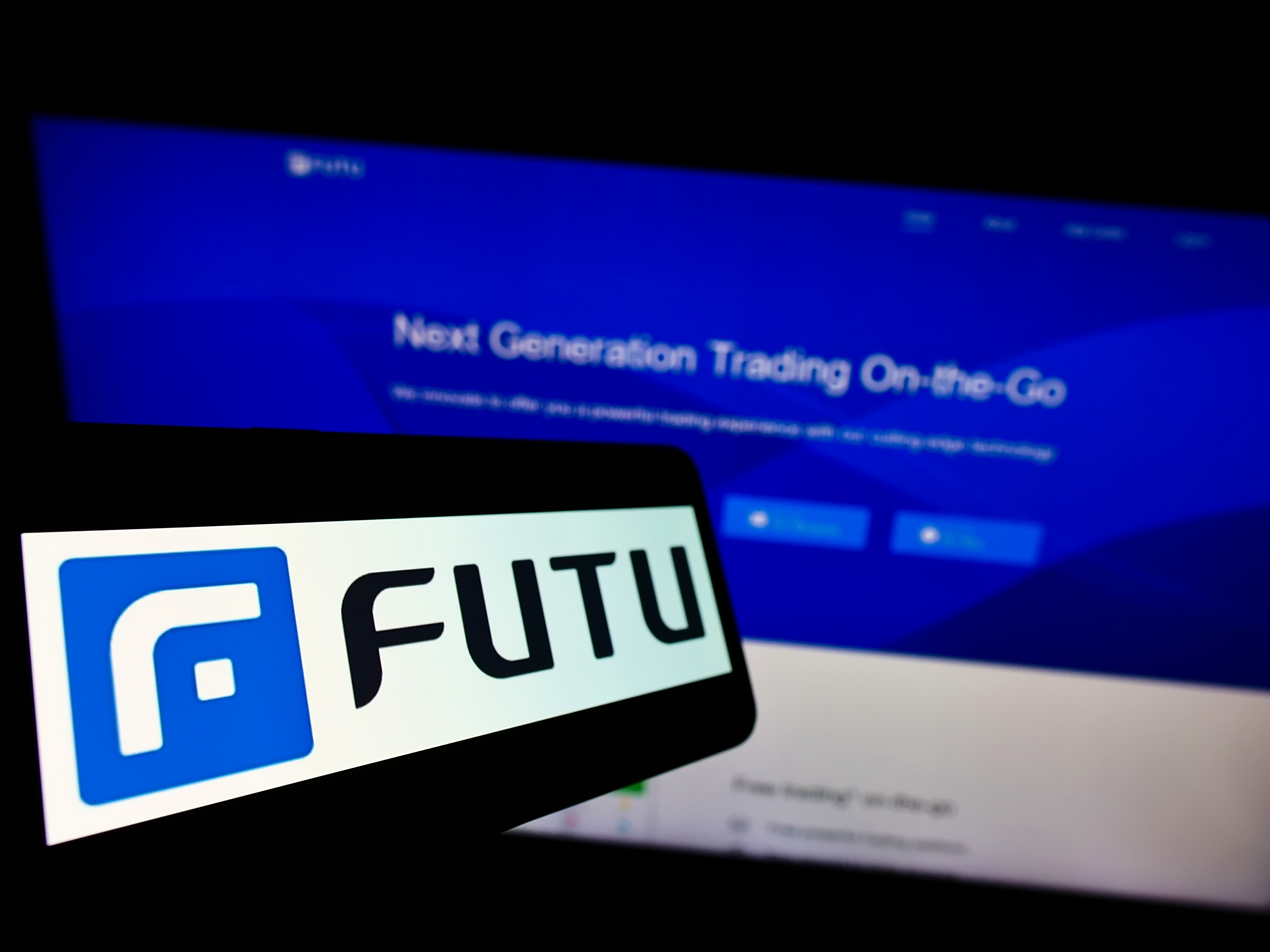 Futu and UP Fintech trading apps will be removed from China app stores this week. Photo: Shutterstock 
