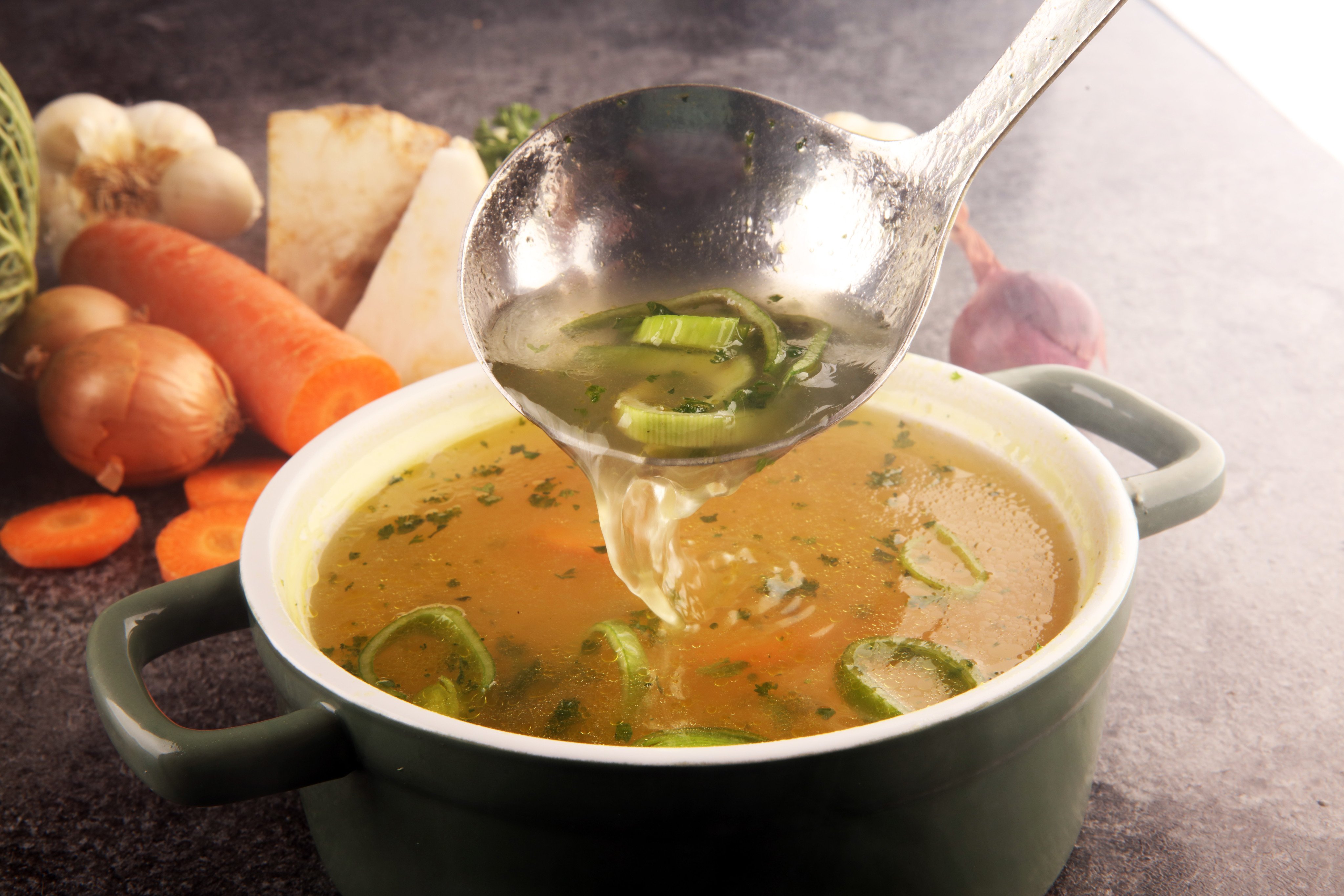 Hearty and comforting vegetable broth that extracts the goodness of plants is becoming just as popular as bone broth on social media. Experts explain some of the health benefits. Photo: Shutterstock