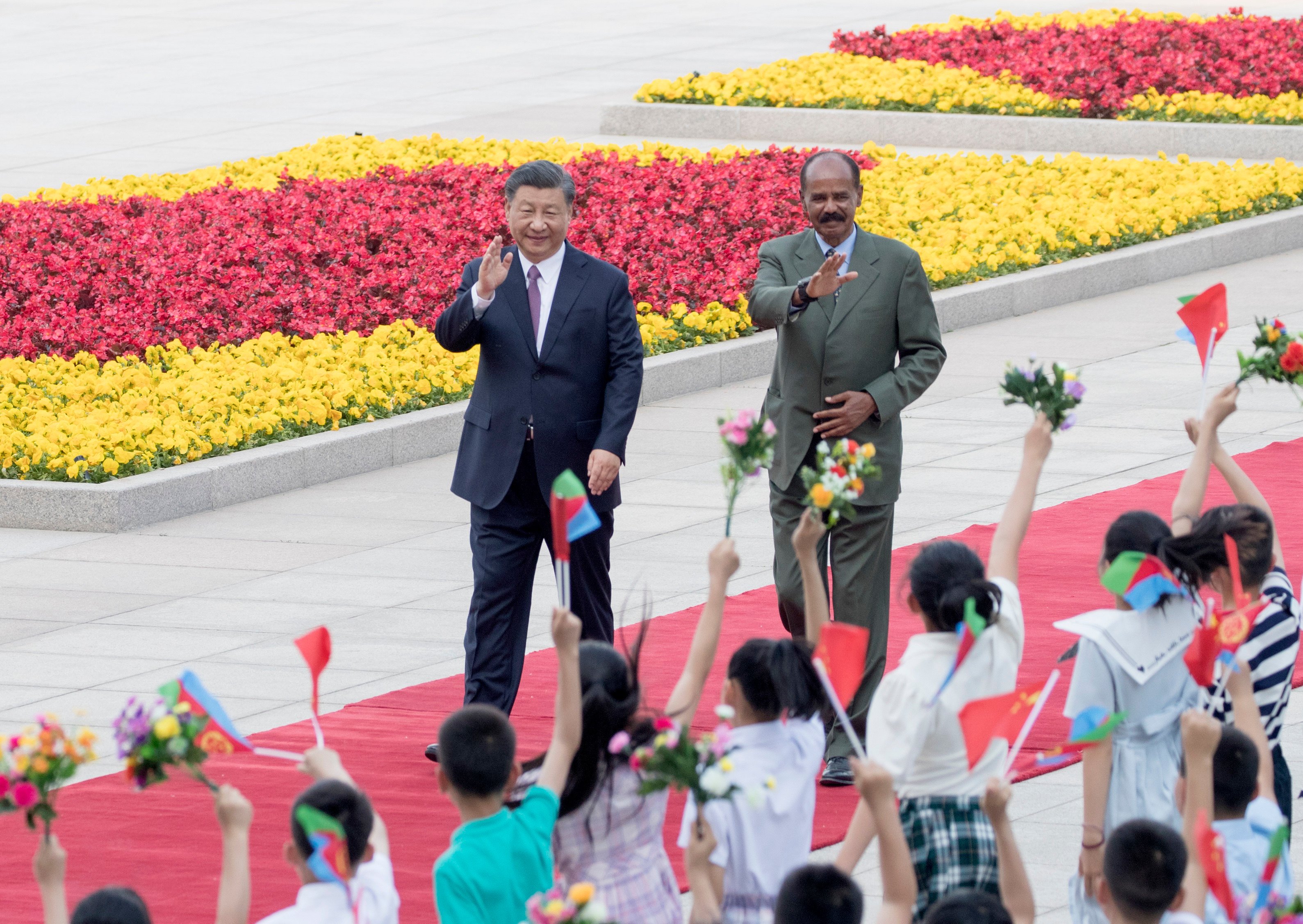 Chinese President Xi Jinping with Eritrean President Isaias Afewerki at welcoming ceremonies prior to their talks in Beijing on Monday. Photo: Xinhua 