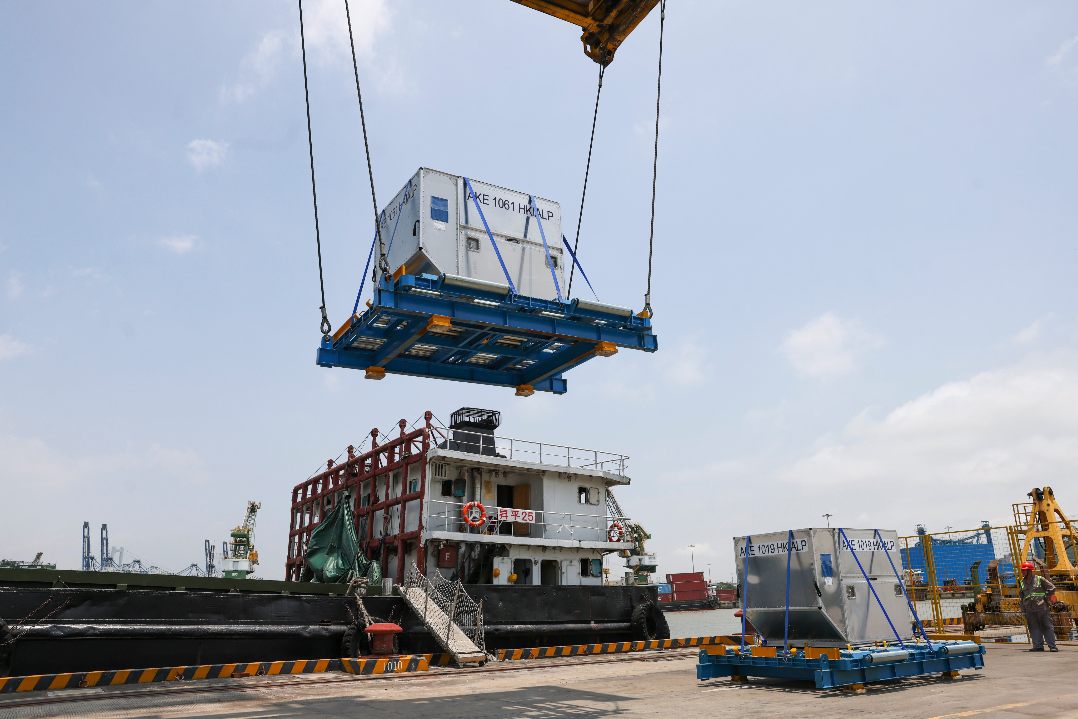 Cargo is placed on a designated ship that will take it from a logistics park in Dongguan to a pier at the Hong Kong International Airport. Photo: May Tse