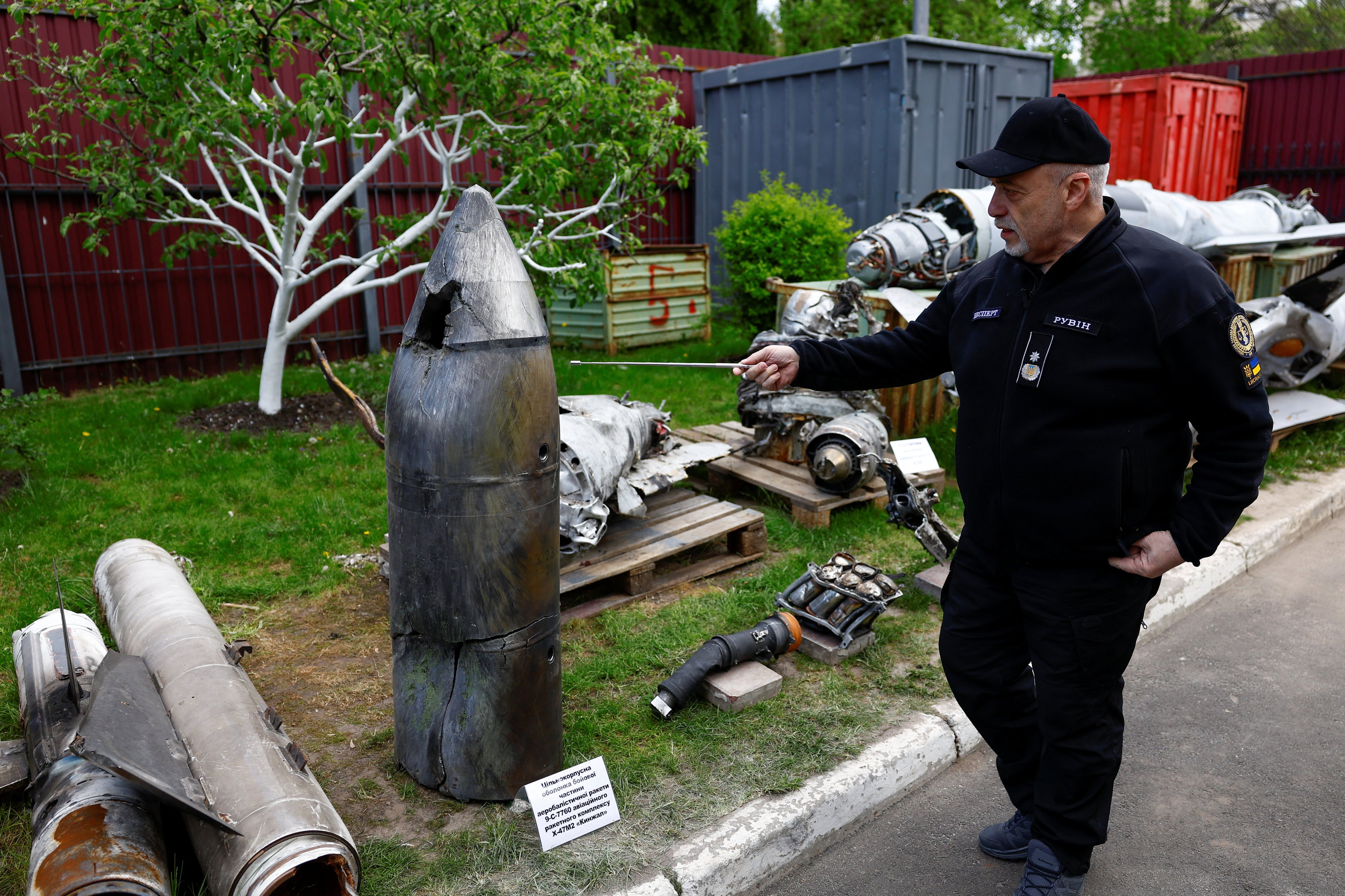 Oleksandr Ruvin, director of the Kyiv Scientific Research Institute of Forensic Expertise, examines a Russian Kinzhal hypersonic missile warhead shot down by a Ukrainian air defence unit in Kyiv on May 12. Photo: Reuters