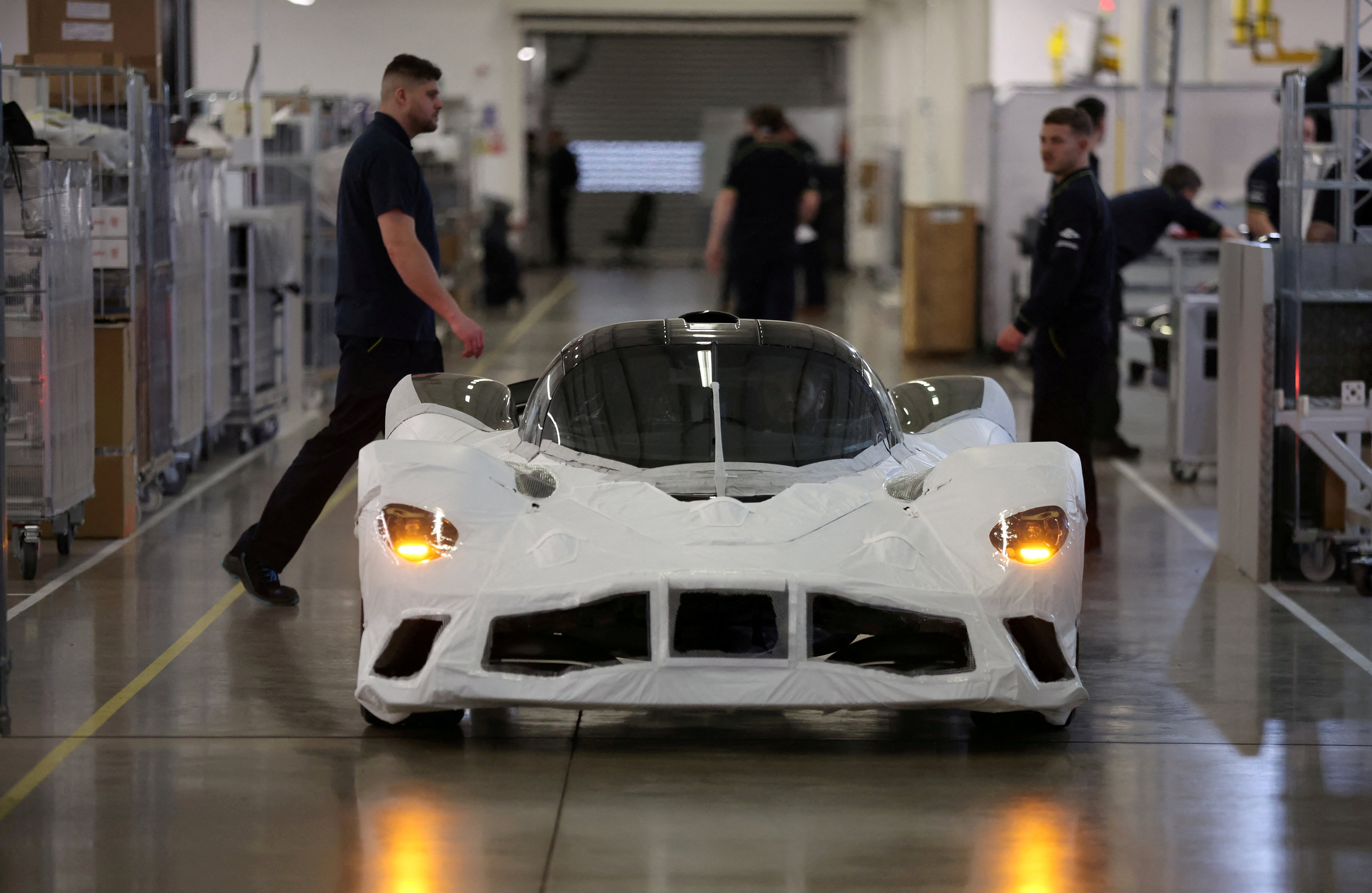 An Aston Martin Valkyrie car is driven off the production line at the company’s factory in Gaydon, Britain, on March 16, 2022. Photo: Reuters