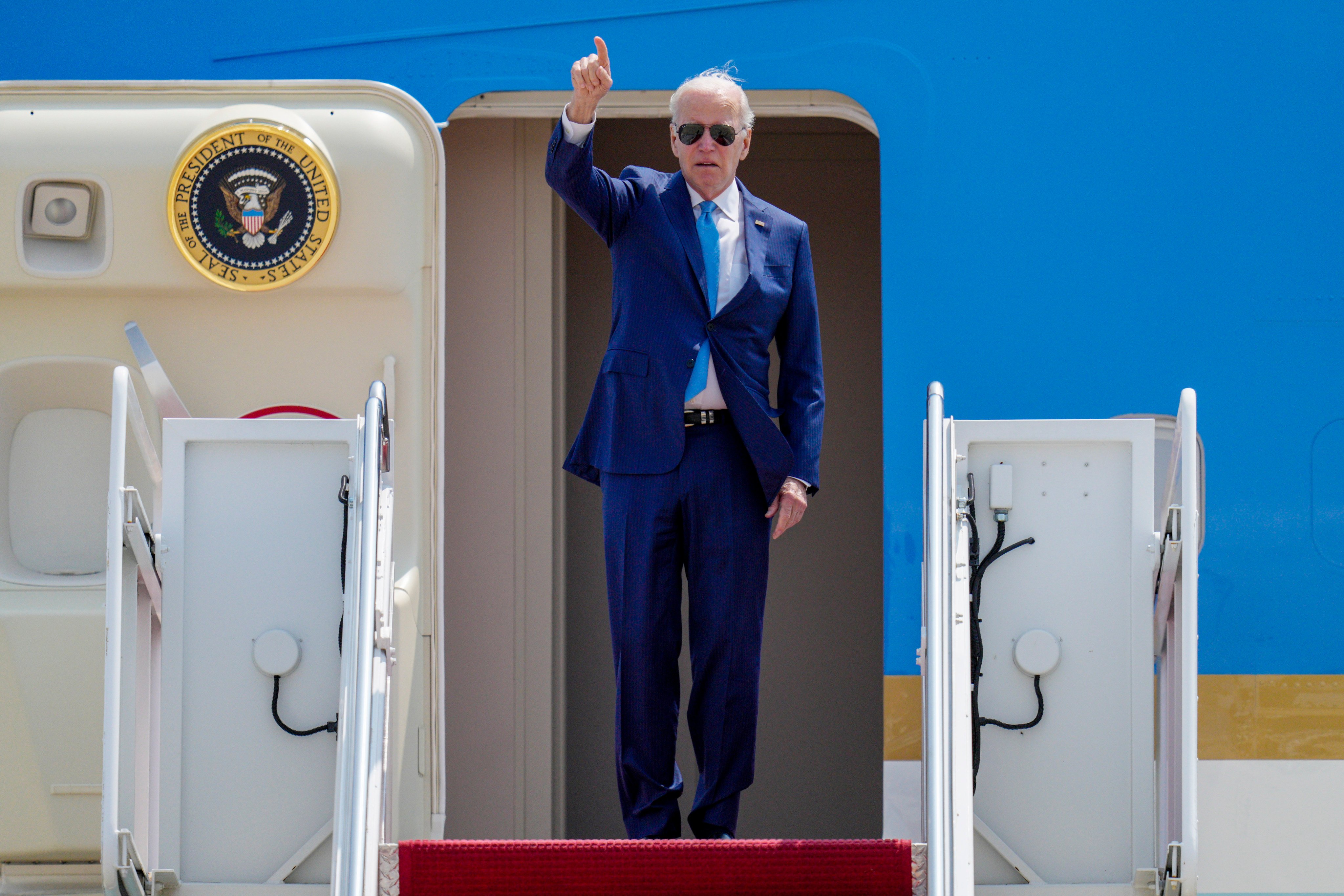 US President Joe Biden gestures as he boards Air Force One at Andrews Air Force Base on Wednesday, as he heads to Hiroshima, Japan for a G7 summit. Photo: AP