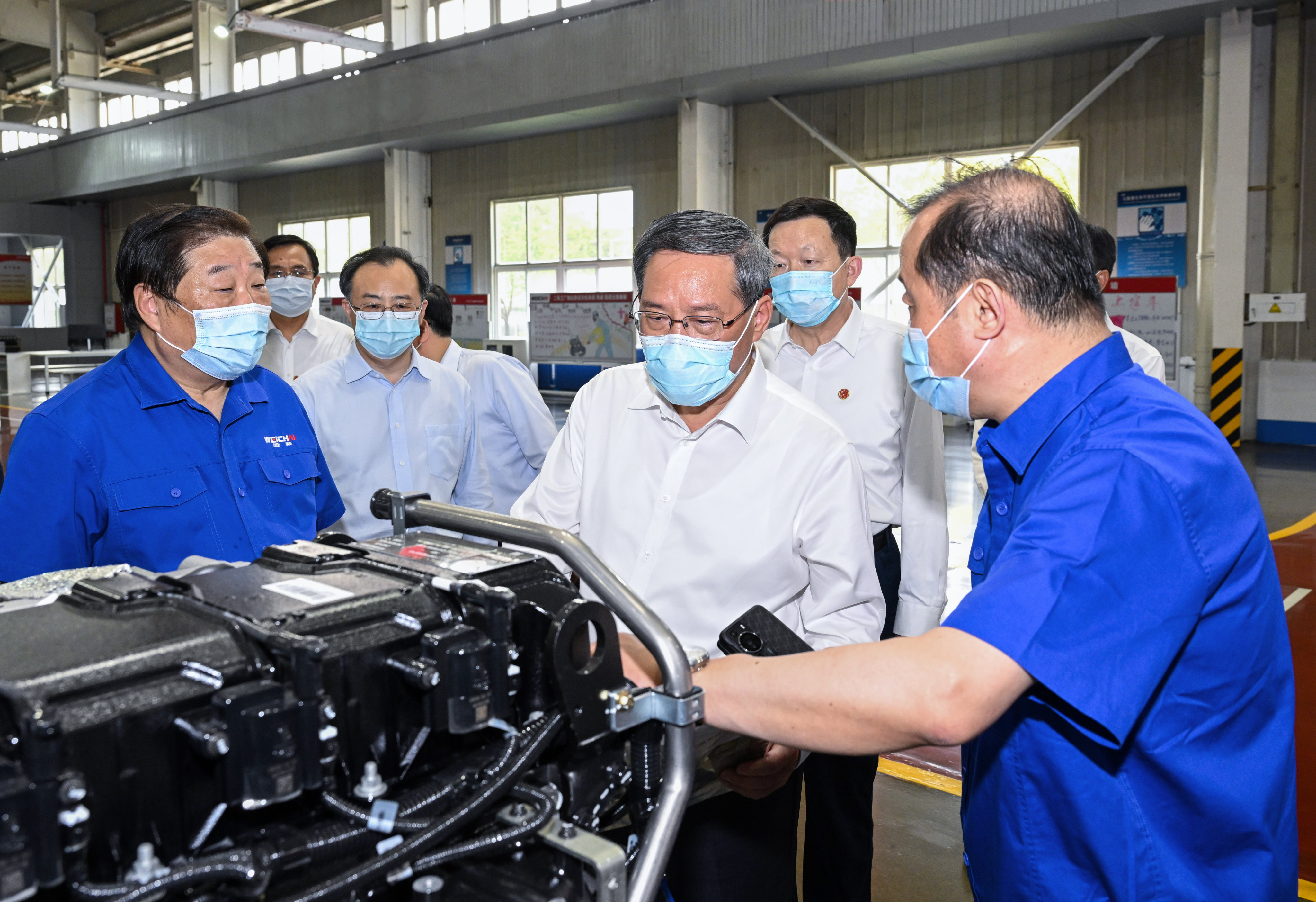Premier Li Qiang visits Weichai Holding Group in Weifang, Shandong province, on Wednesday. Photo: Xinhua