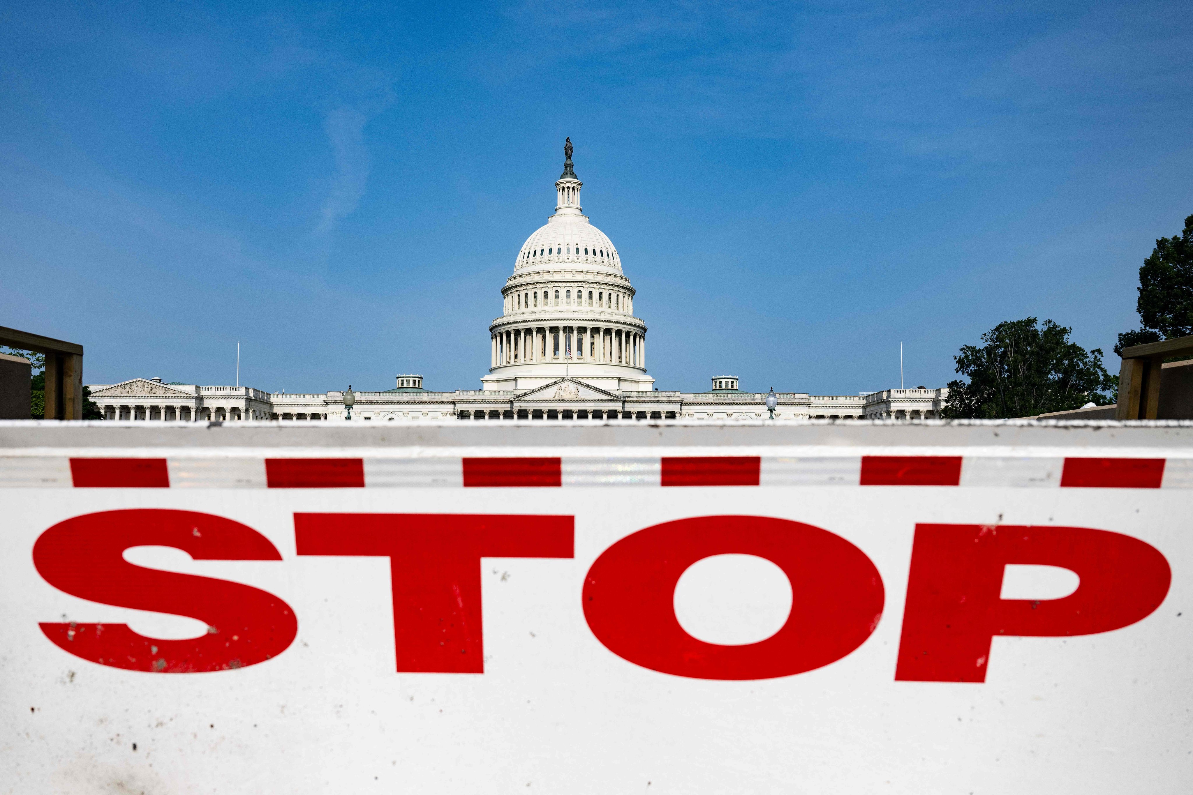 A barrier to stop vehicles stands in front of the US Capitol in Washington on May 11. Unless the US Congress votes to raise or suspend the debt ceiling, the country risks defaulting on its US$31.4 trillion debt. Photo: AFP