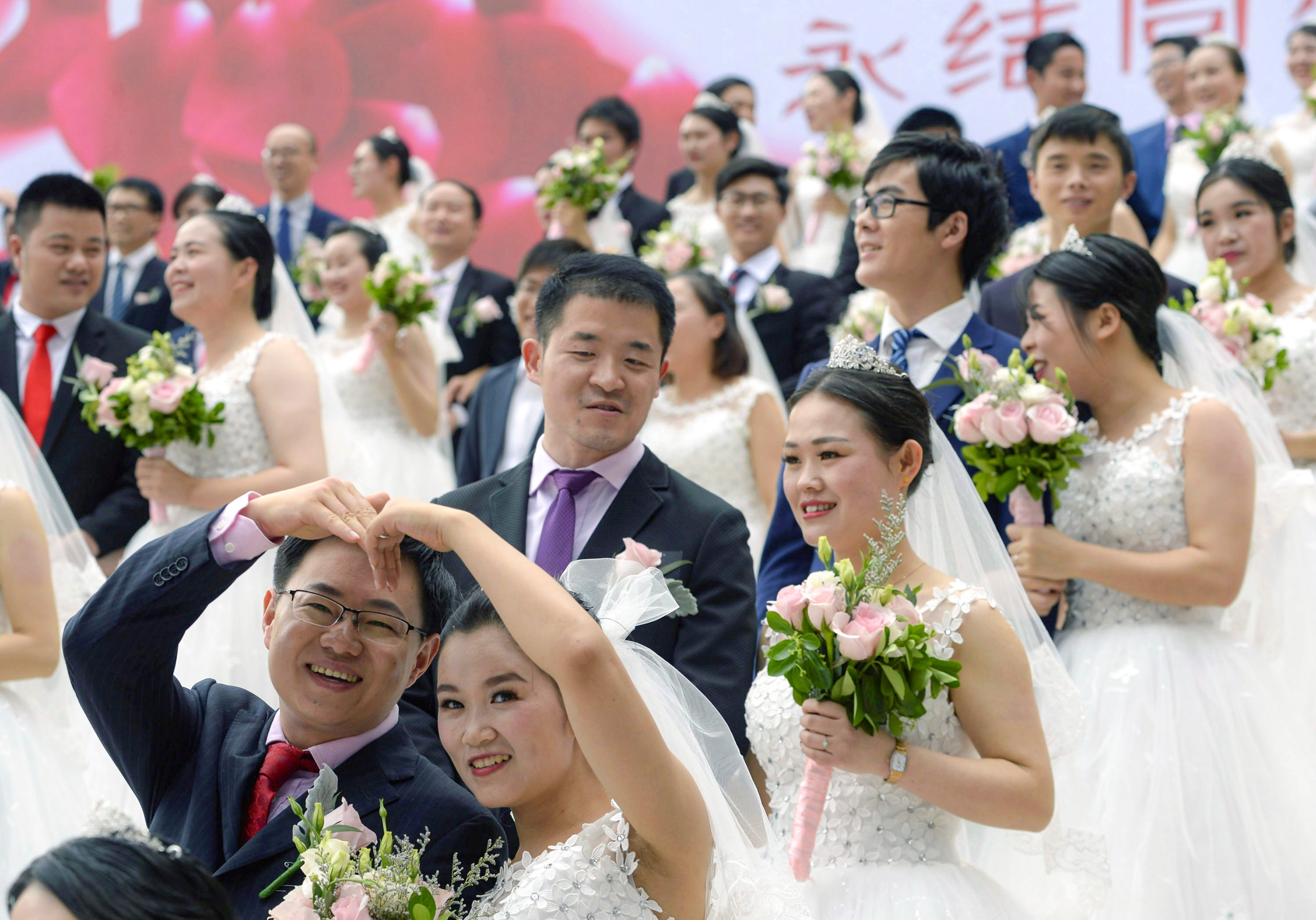 Couples in many parts of the country will no longer have to return to place of their hukou to register their marriage. Photo: Visual China Group