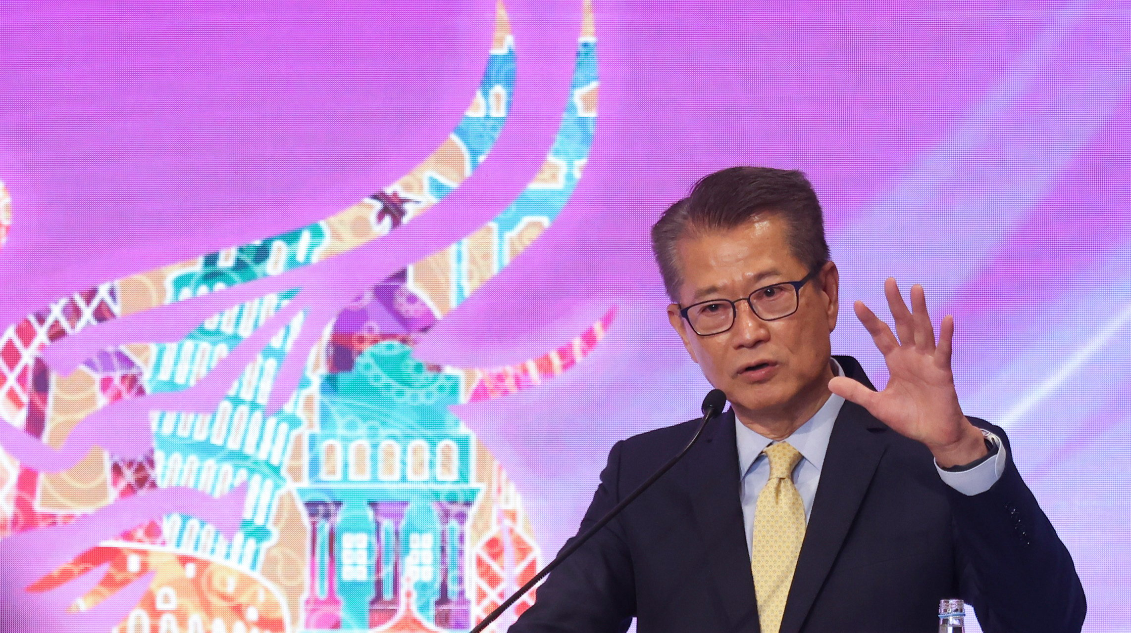 Hong Kong Financial Secretary Paul Chan Mo-po delivers a keynote at the 2nd World Chinese Accountants Conference, held at the Hong Kong Convention and Exhibition Centre in Wan Chai on Saturday. Photo: Jonathan Wong