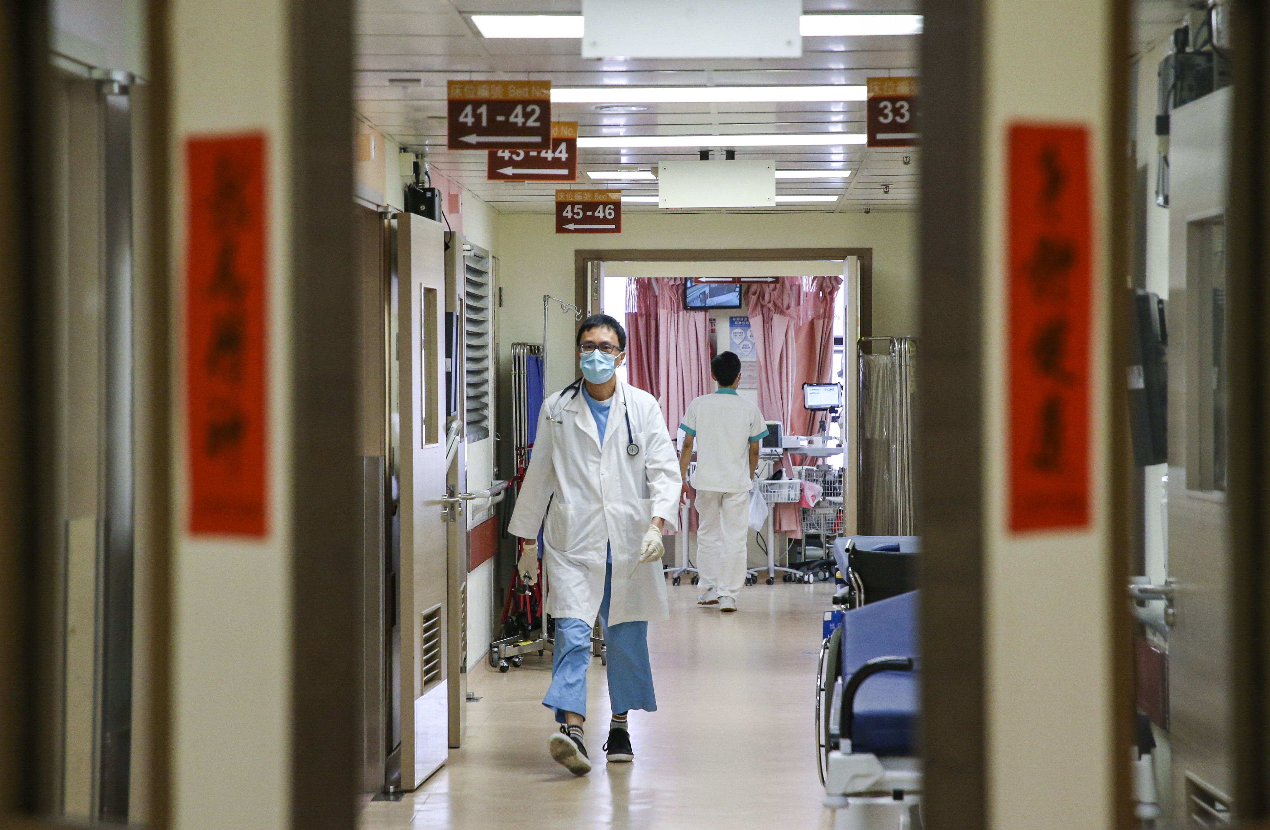 Medical staff at Queen Elizabeth Hospital in Yau Ma Tei. Hong Kong is battling a shortfall in doctors. Photo: Felix Wong