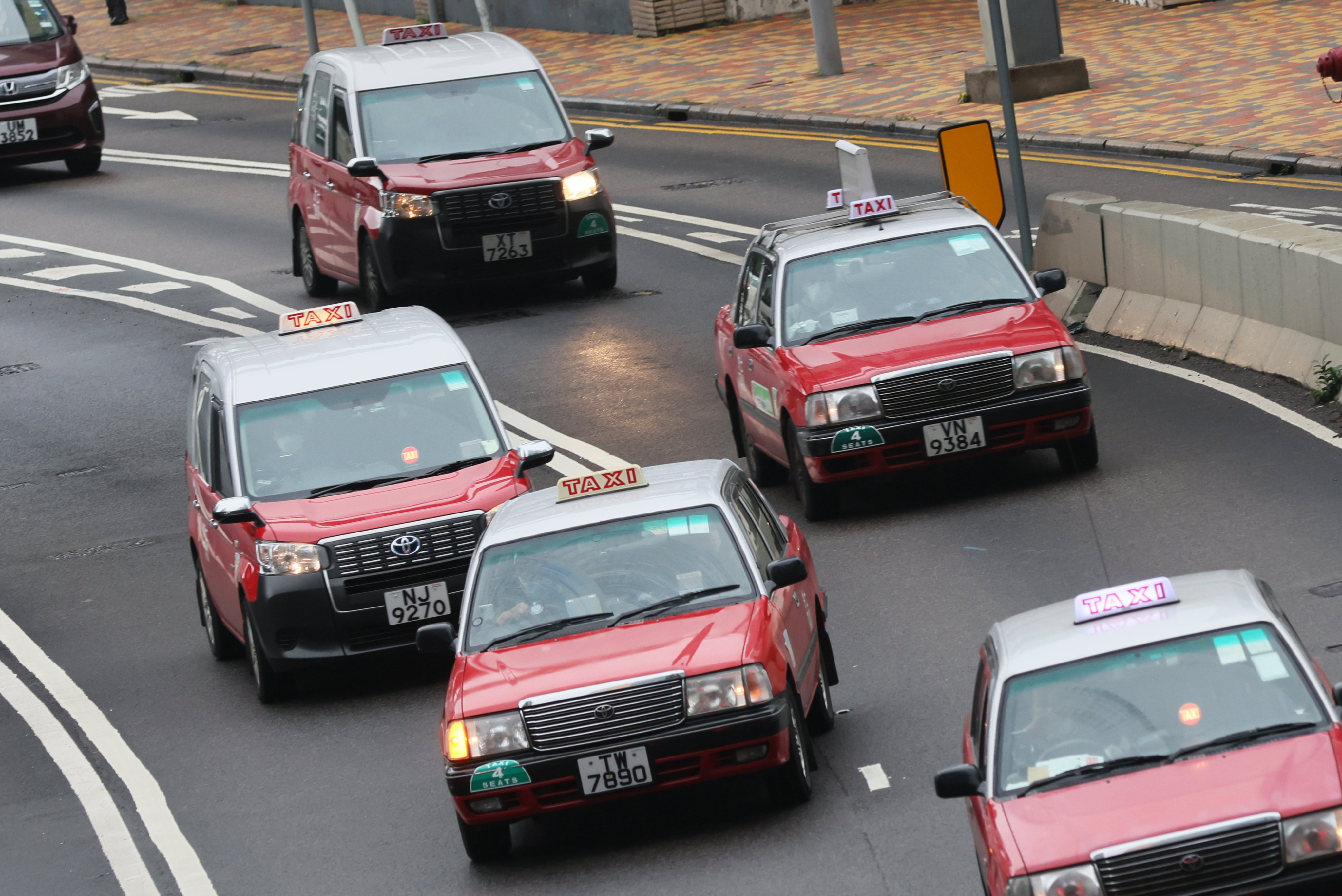 Hong Kong aims to increase the number of electric taxis operating in the city. Photo: Dickson Lee