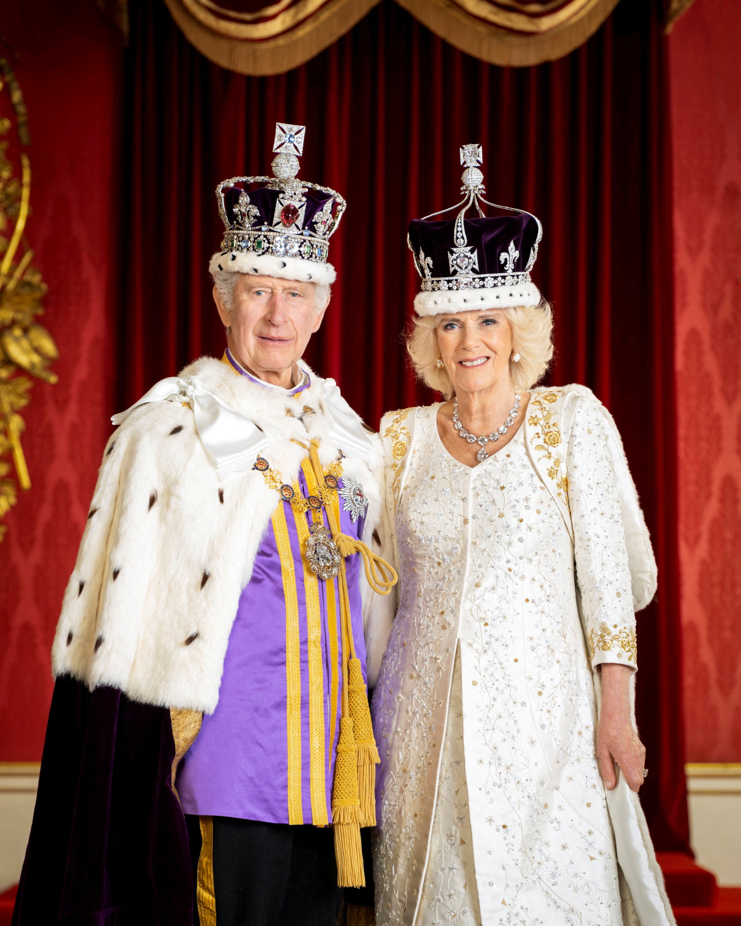 For their coronations, Britain’s King Charles and Queen Camilla are decked out in Britain’s Crown Jewels in the Throne Room at Buckingham Palace, London, UK, on May 8. Photo: Reuters