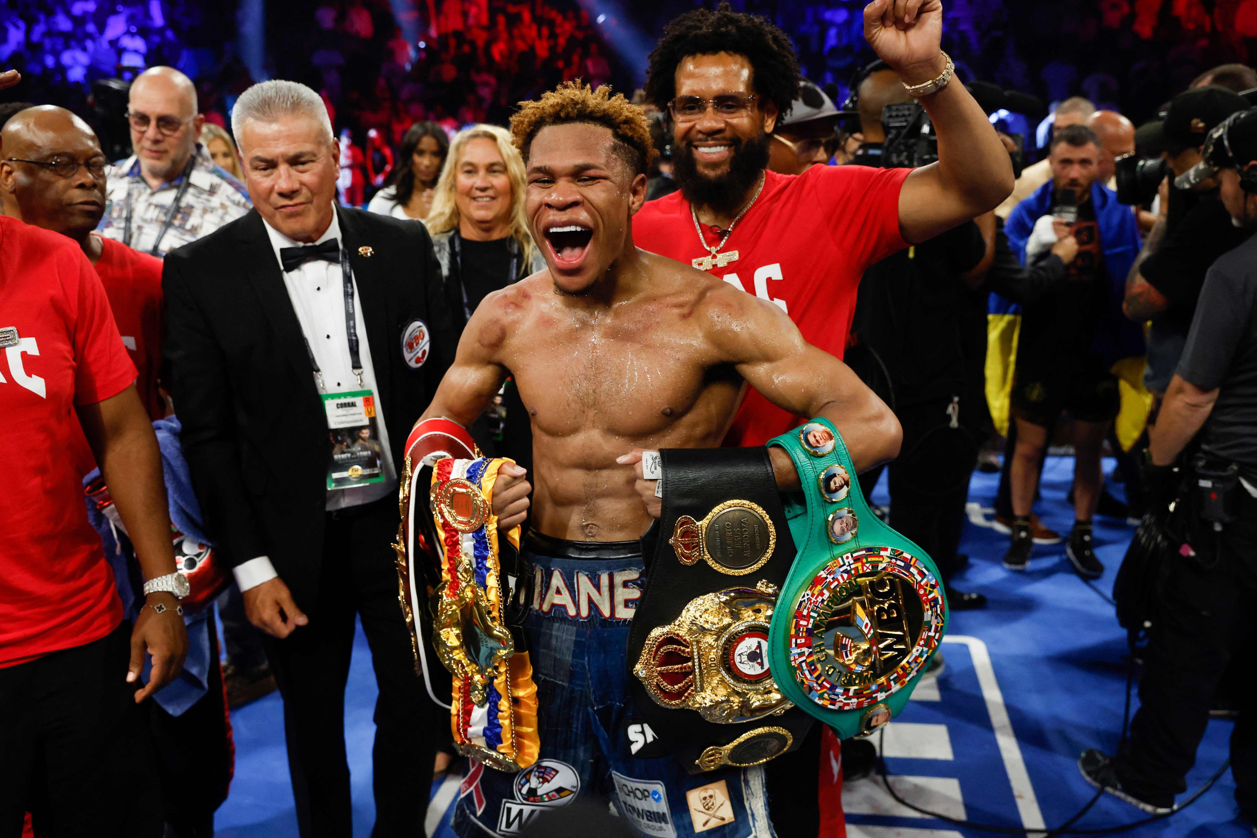 Devin Haney celebrates after defeating Vasiliy Lomachenko of Ukraine during their undisputed lightweight championship fight at MGM Grand Garden Arena on May 20, 2023 in Las Vegas, Nevada.   Photo: AFP