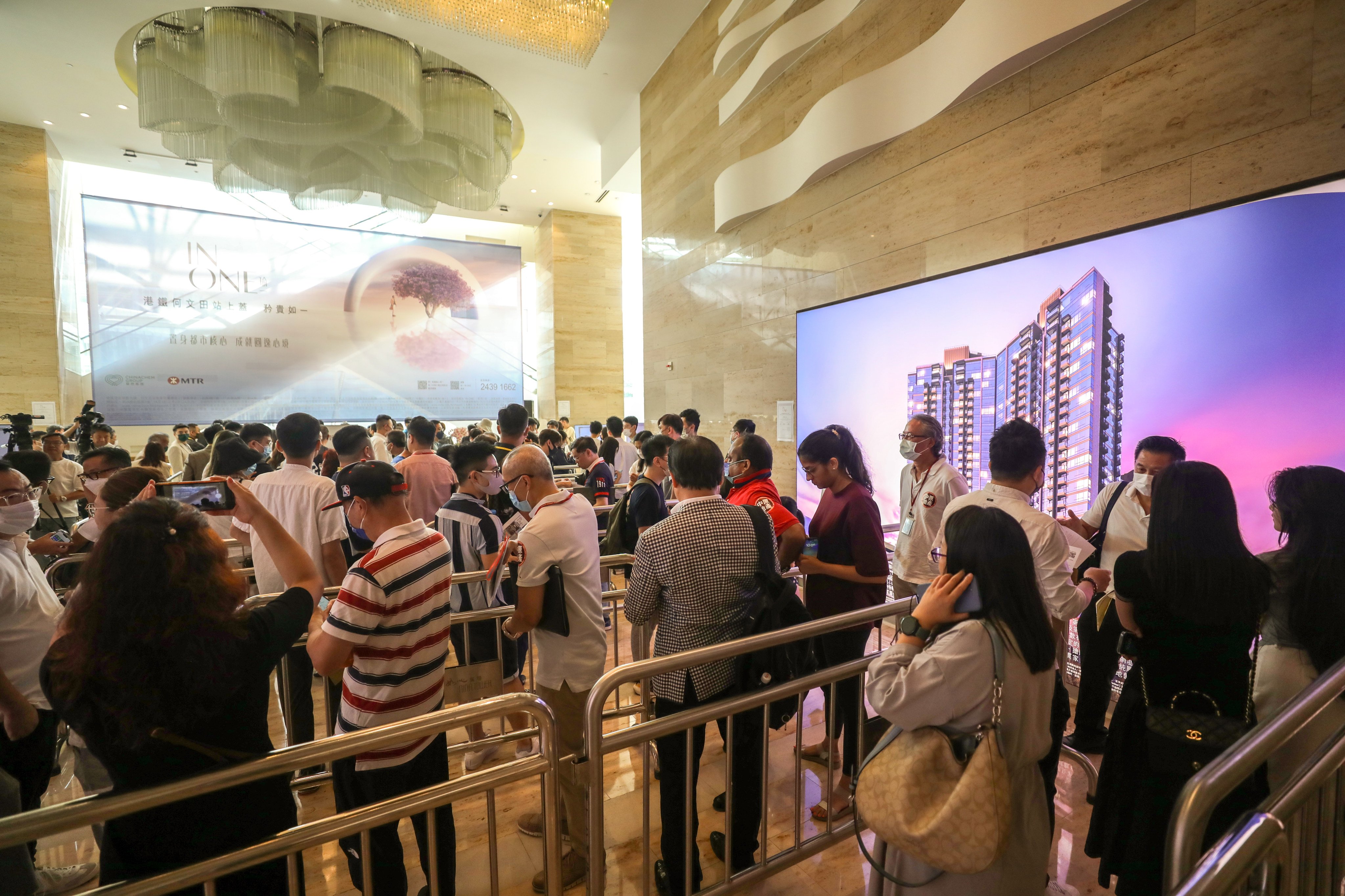 People queue up in Tsuen Wan West to buy units of the In One Above development in Ho Man Tin on May 21, 2023. Photo: Xiaomei Chen