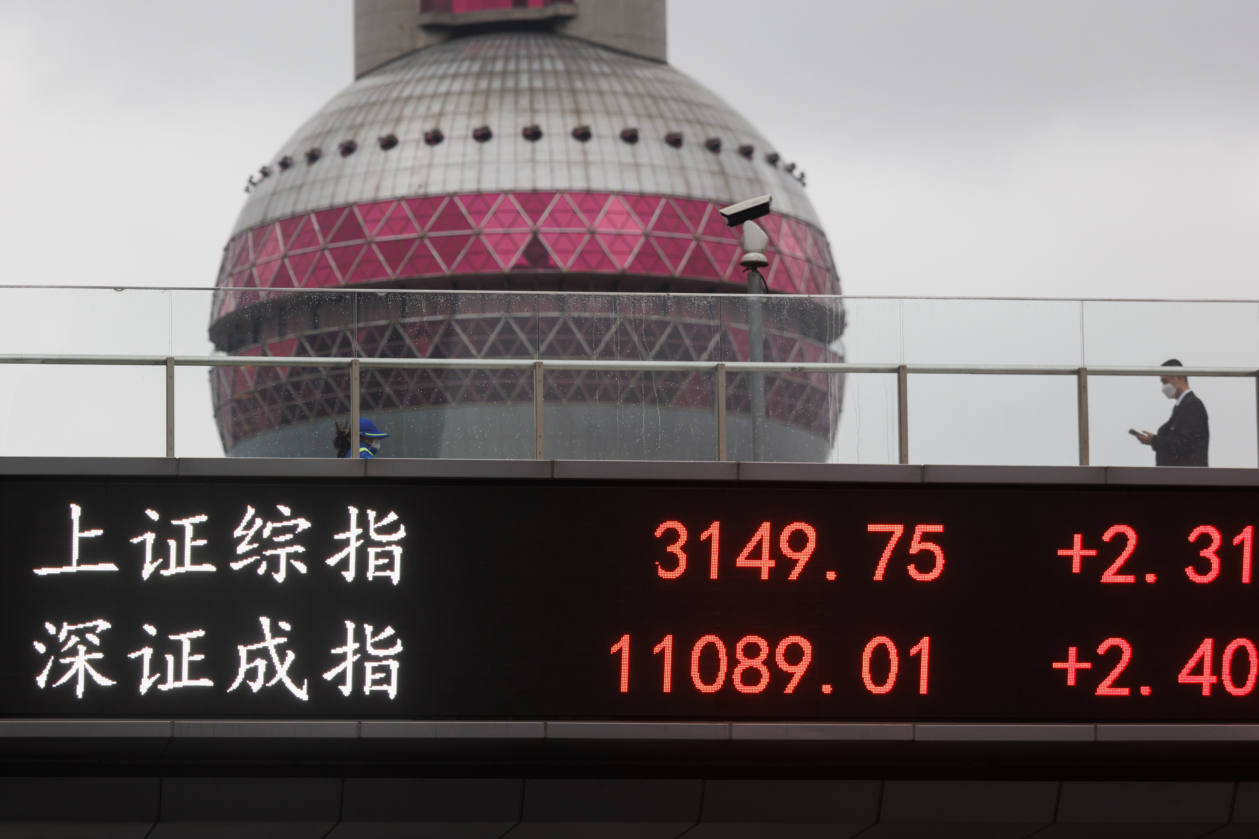 An electronic screen displays stock market data in Shanghai. A top strategist is once again upbeat on Chinese stocks. Photo: Getty Images