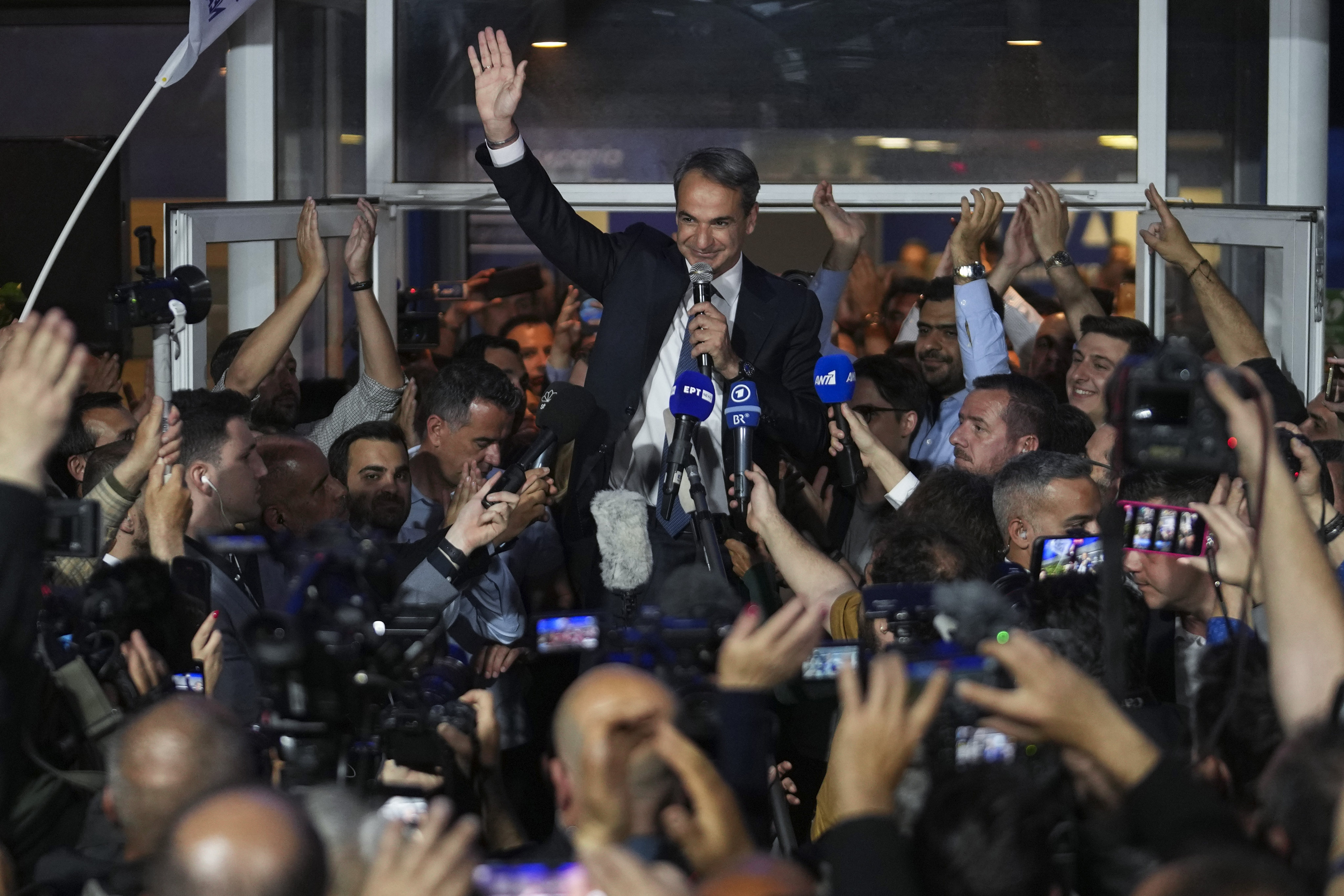 Greece’s Prime Minister Kyriakos Mitsotakis addresses supporters in Athens on Sunday. Photo: AP