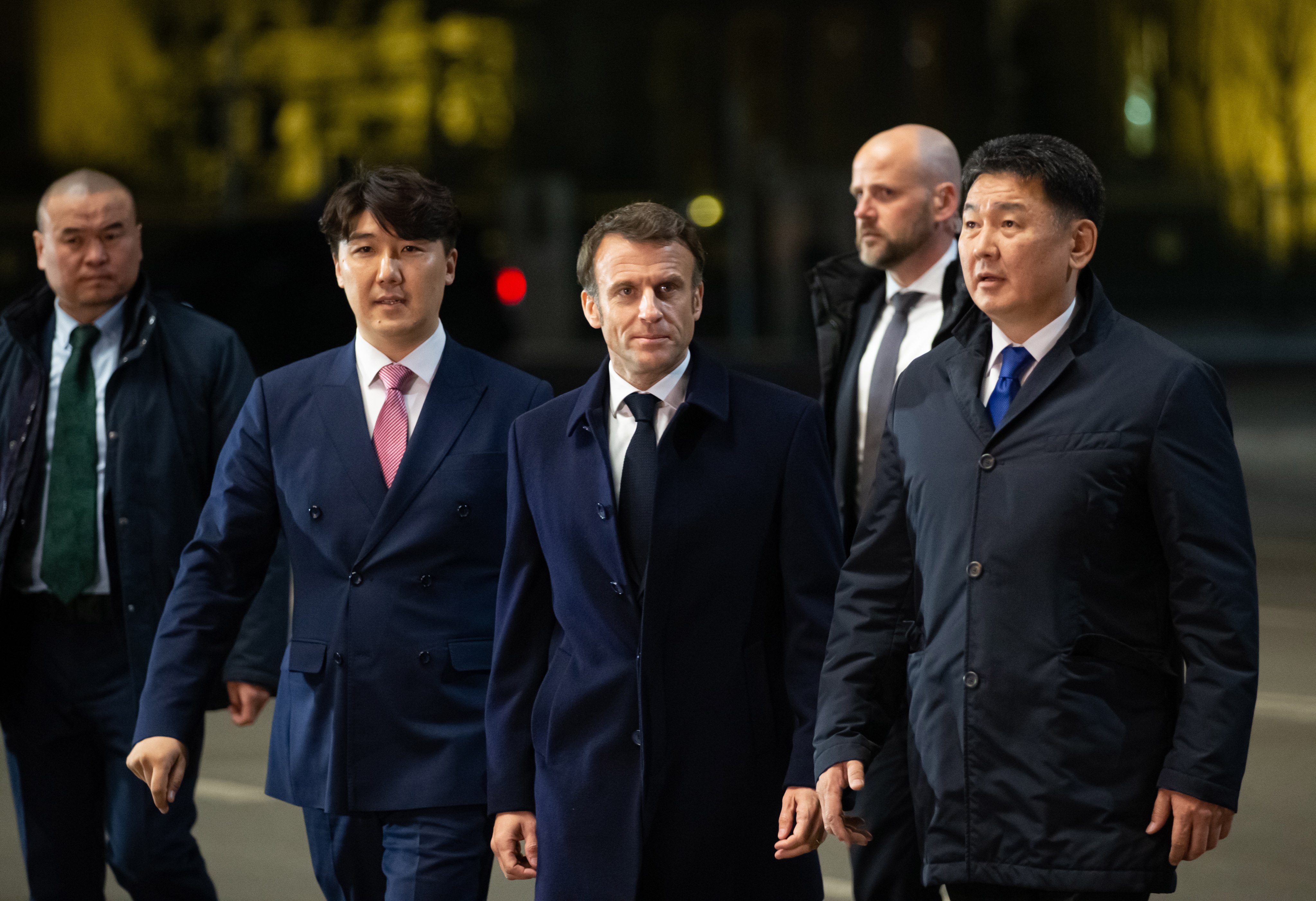 Mongolia’s President Ukhnaagiin Khurelsukh, left, and French President Emmanuel Macron, centre, during a visit to Genghis Khan Museum in Ulaanbaatar, Mongolia on Sunday. Photo:  EPA-EFE