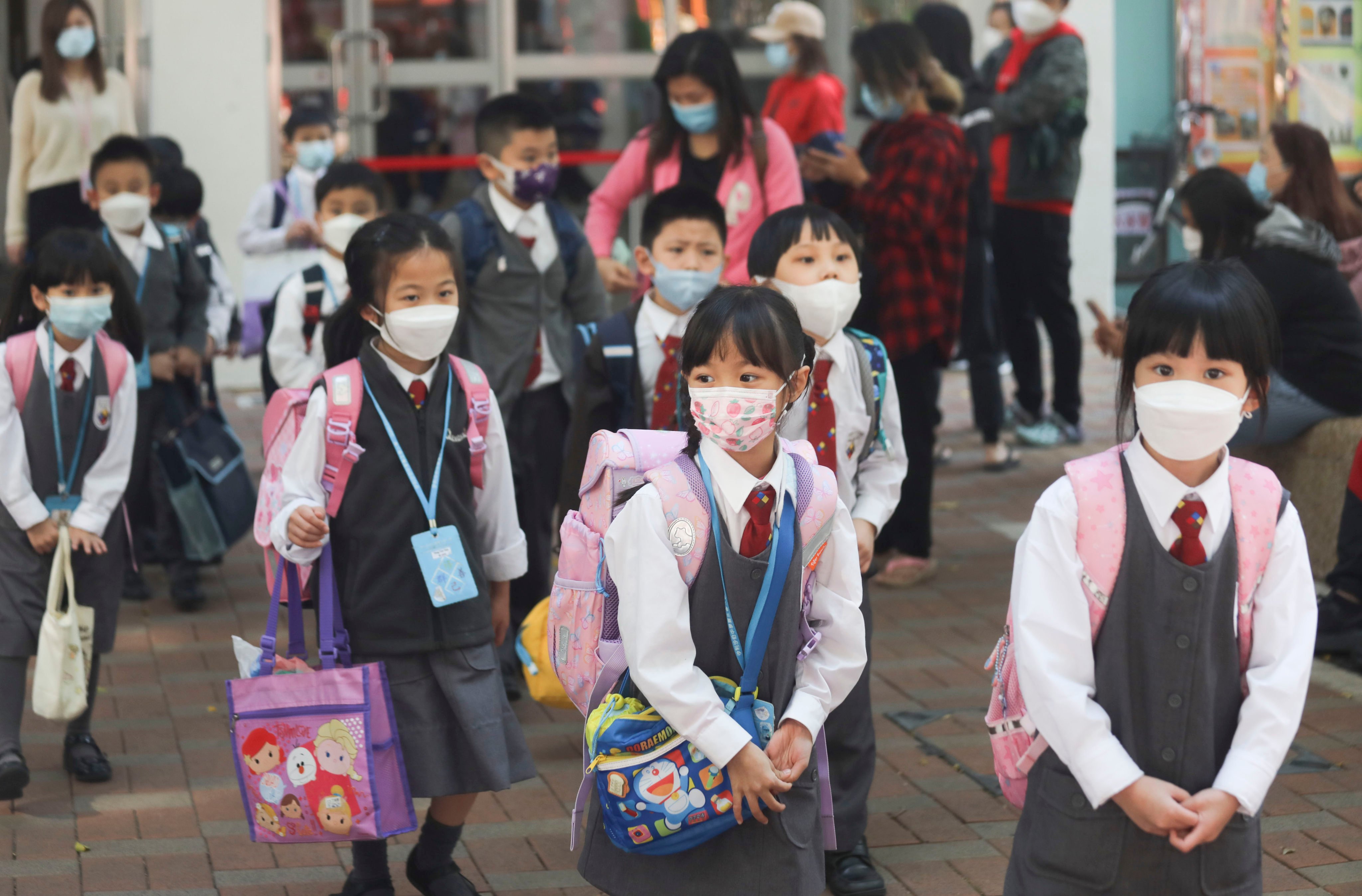 Primary school students leave their campus in Tin Shui Wai on February 28. The government has predicted a structural decline in the school-aged population. Photo: Xiaomei Chen